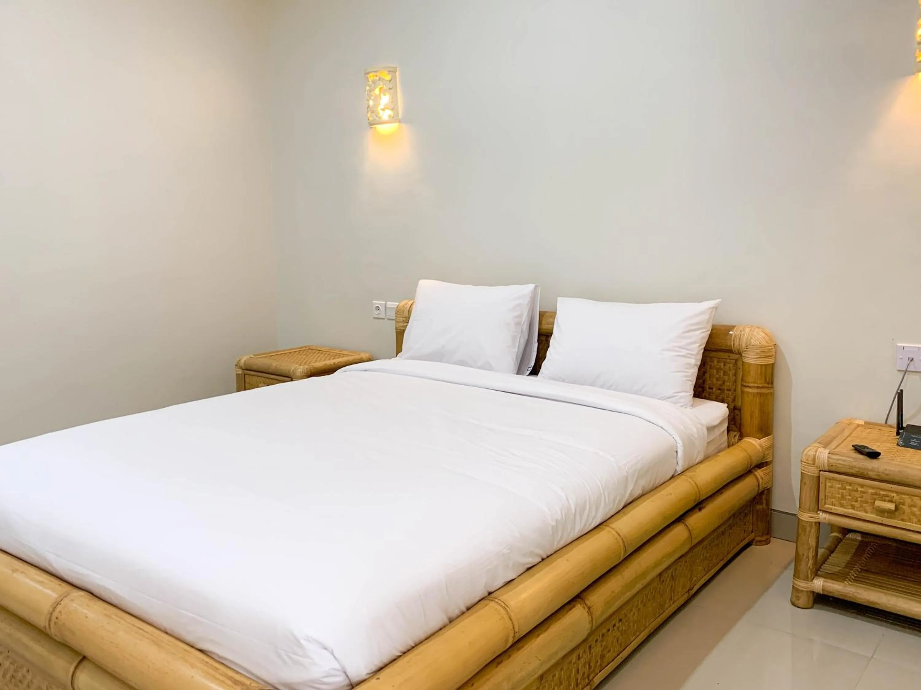 Bed in Candra Loka Studio & Apartment by The Loka