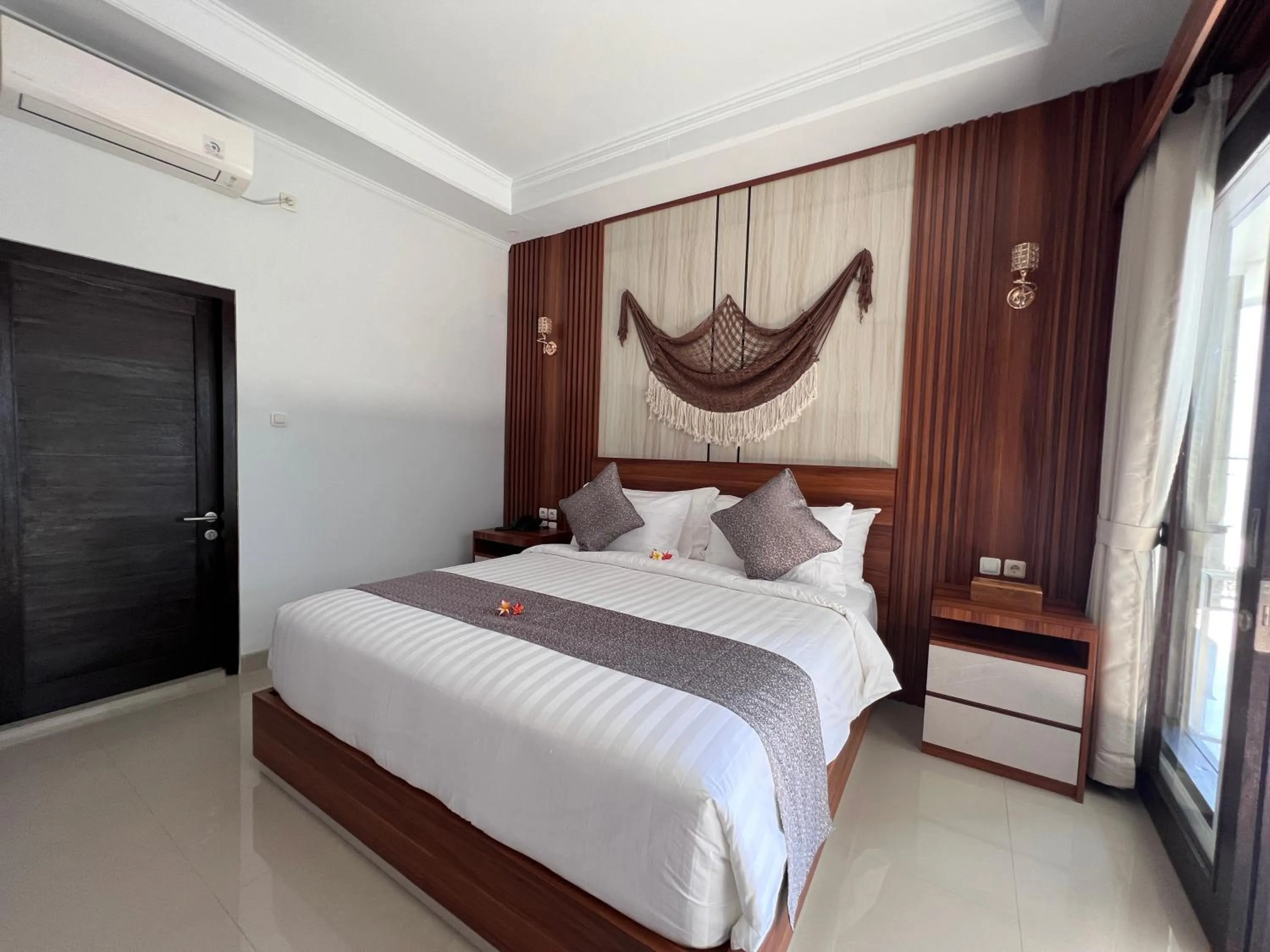 Bed in Grand Yuna Hotel Nusa Penida