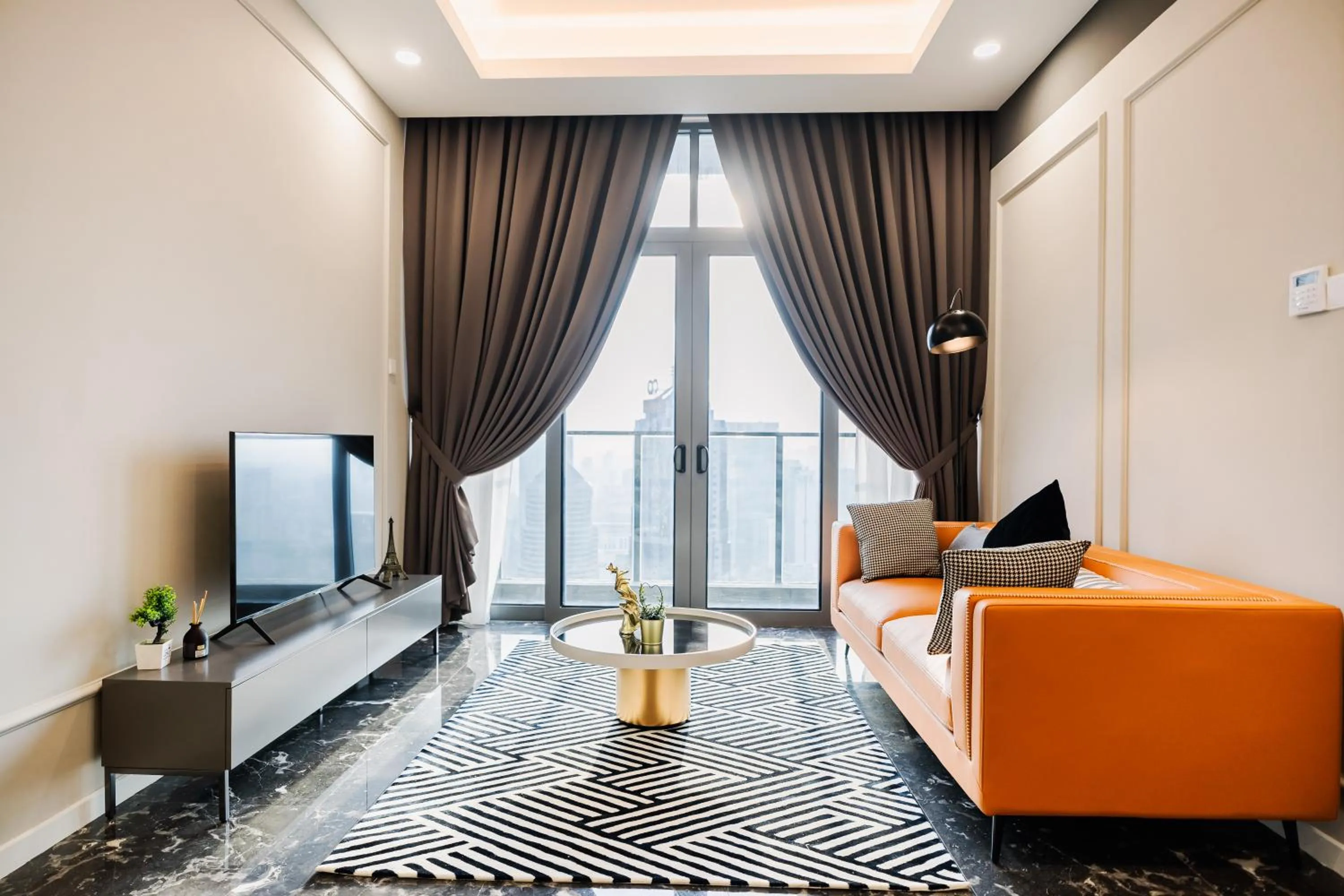 Communal lounge/ TV room in Royce KLCC Kuala Lumpur City Centre by Dormeo Destinations