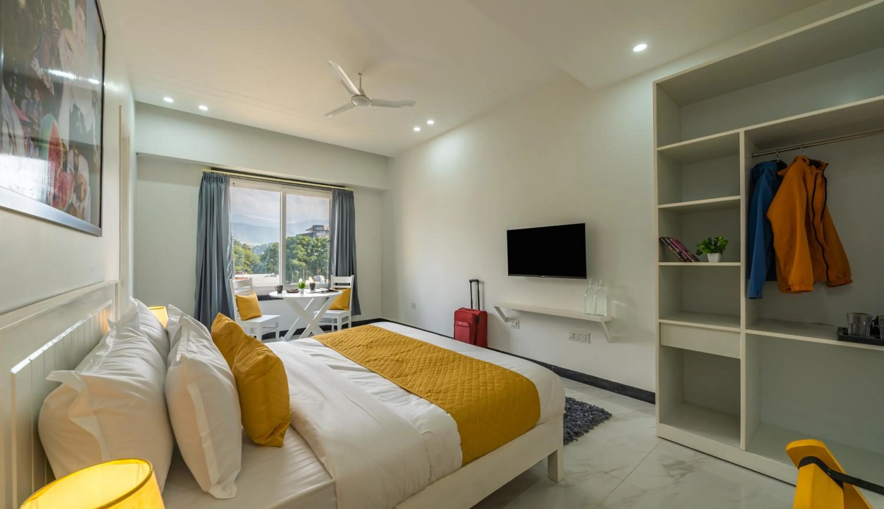 Communal lounge/ TV room, Bed in The Social Stays Dehradun