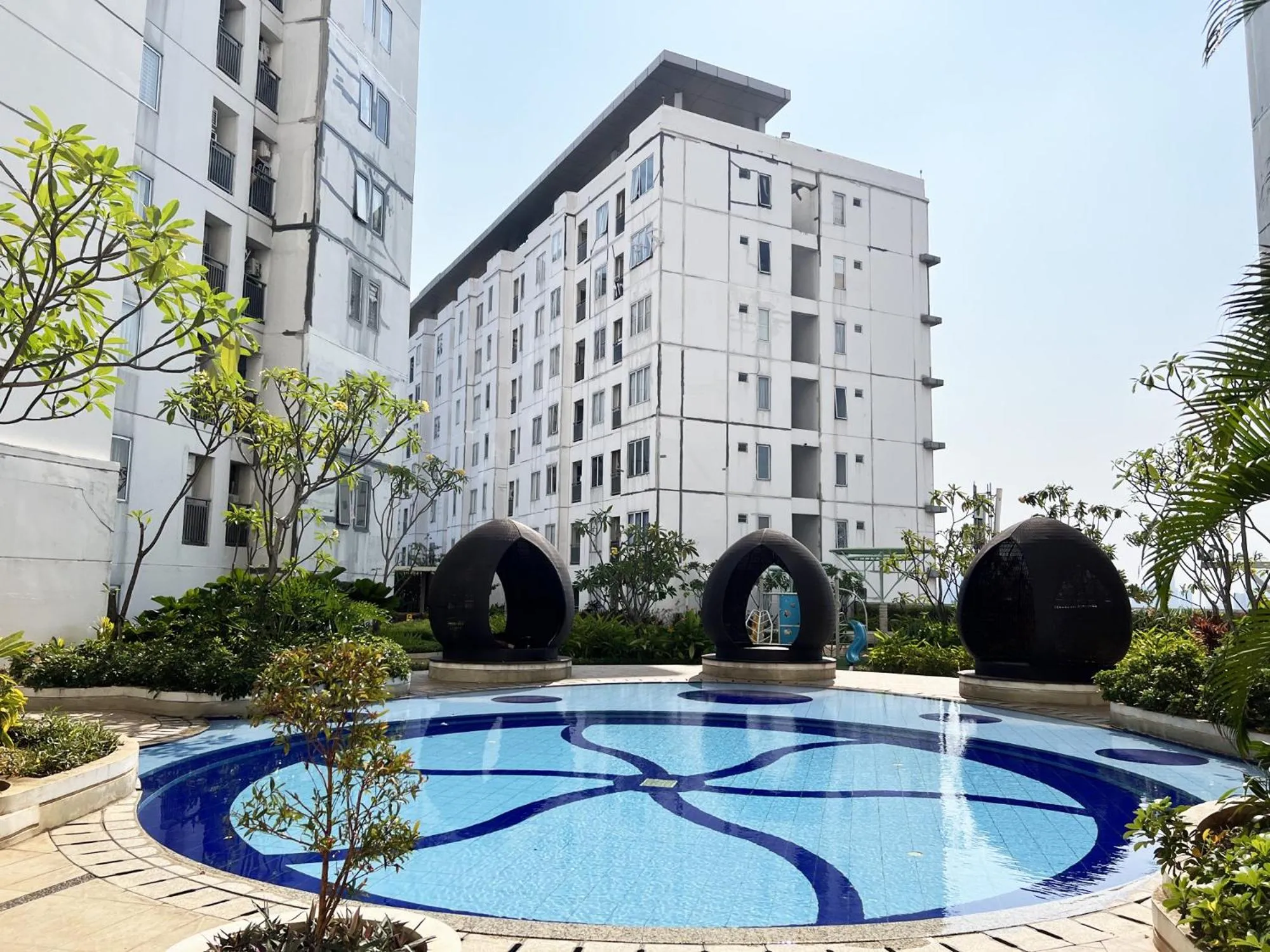 Swimming pool in Bassura Apartment by Aok Property