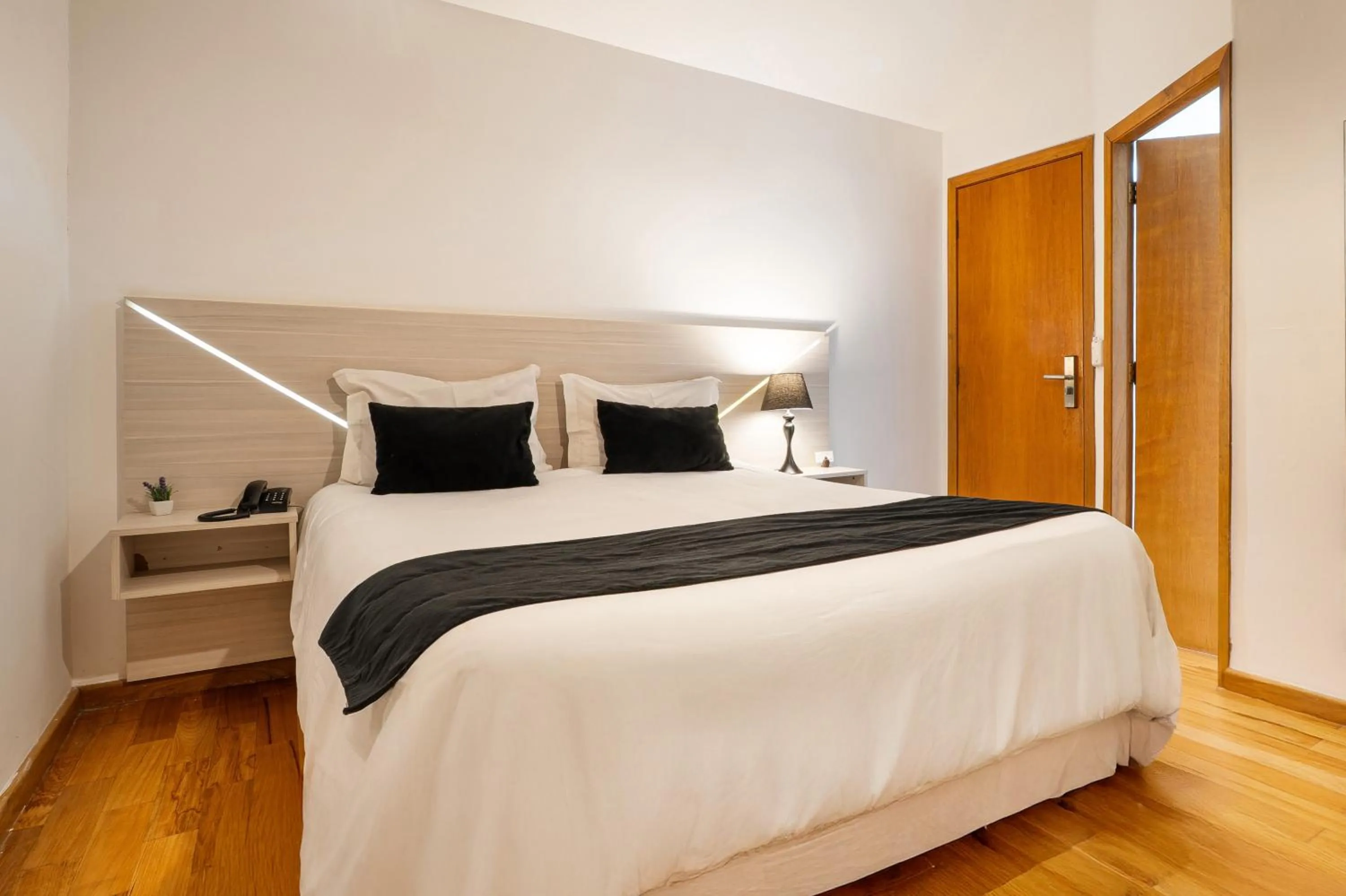 Photo of the whole room, Bed in Pousada Apple House Campos do Jordao