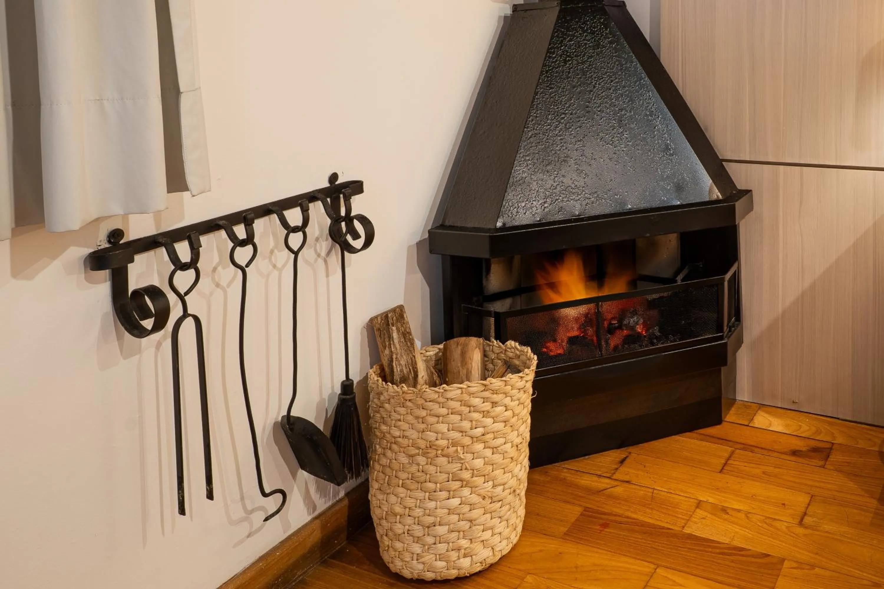 fireplace in Pousada Apple House Campos do Jordao