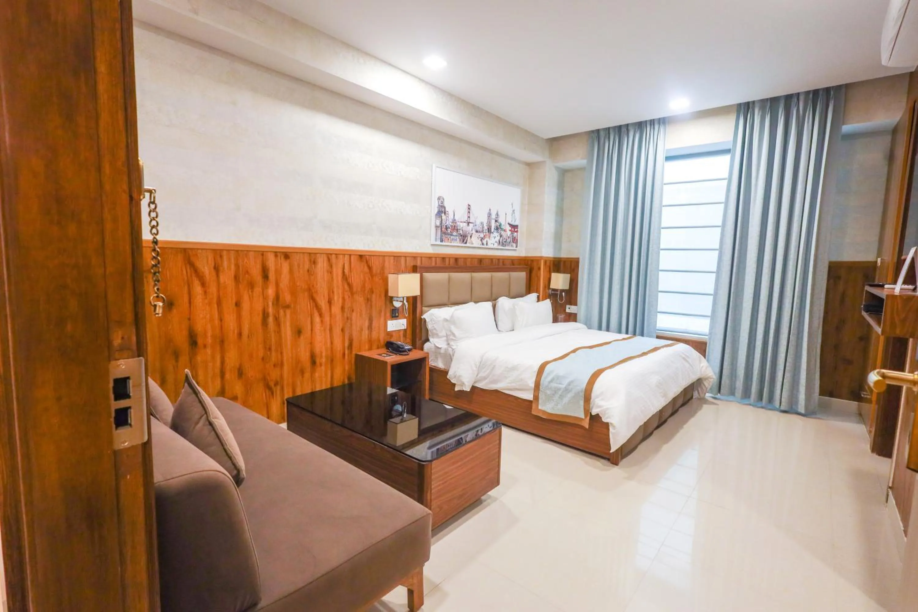 Seating area, Bed in Clay Inn Hotel, Sohna Road, Sector 49, Gurugram