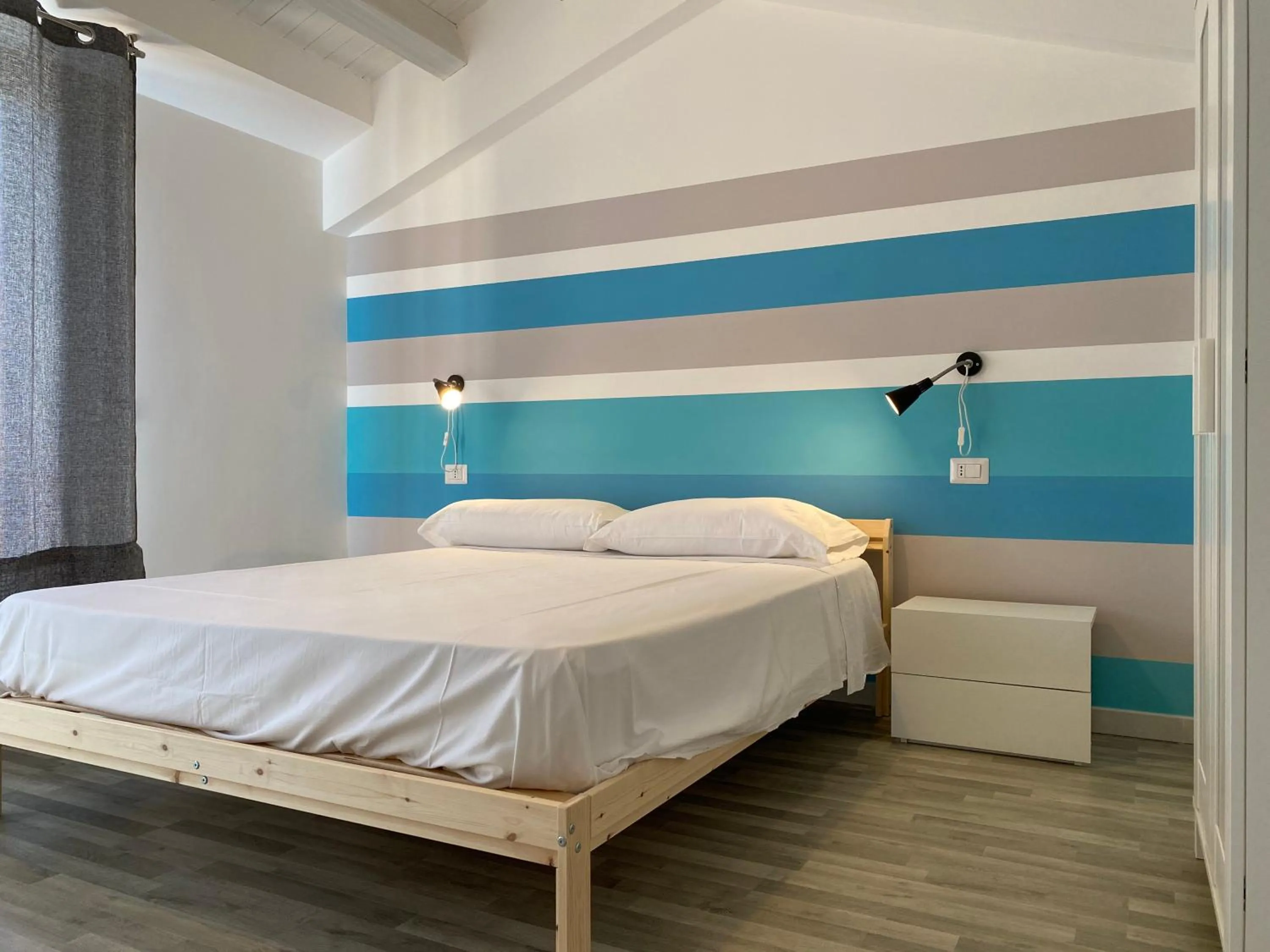 Bed in Marina di Petrolo Apartments
