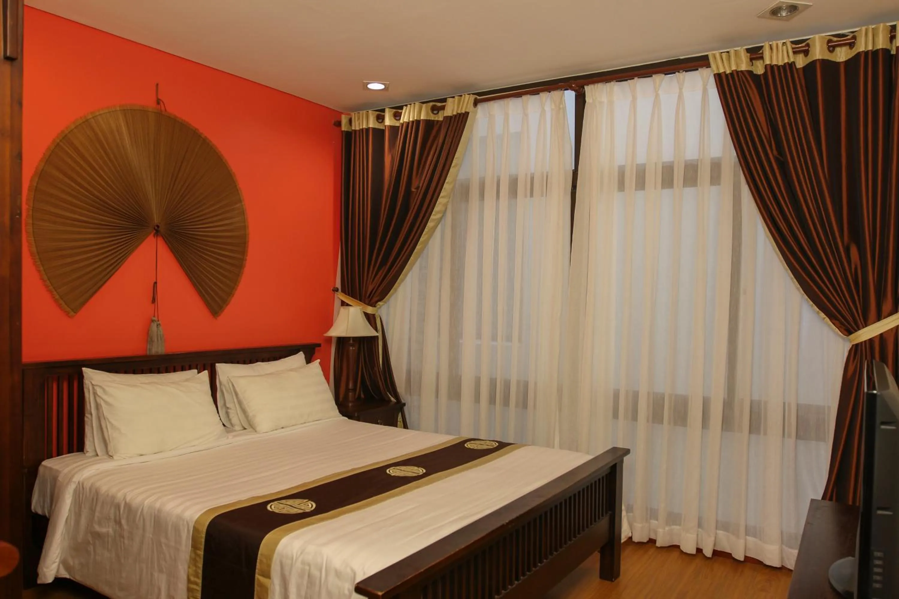 Bed in Nam Bo Boutique Hotel