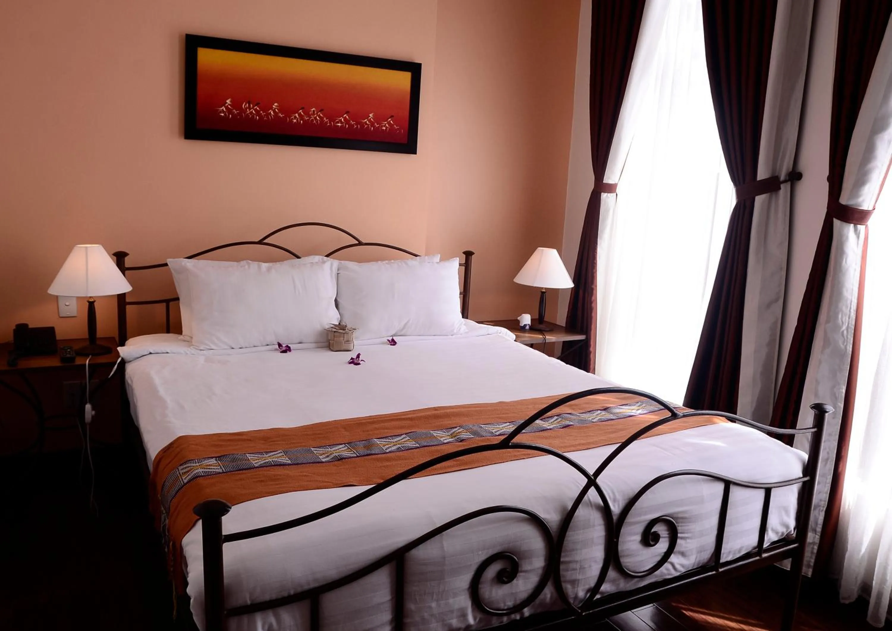 Bed in Nam Bo Boutique Hotel