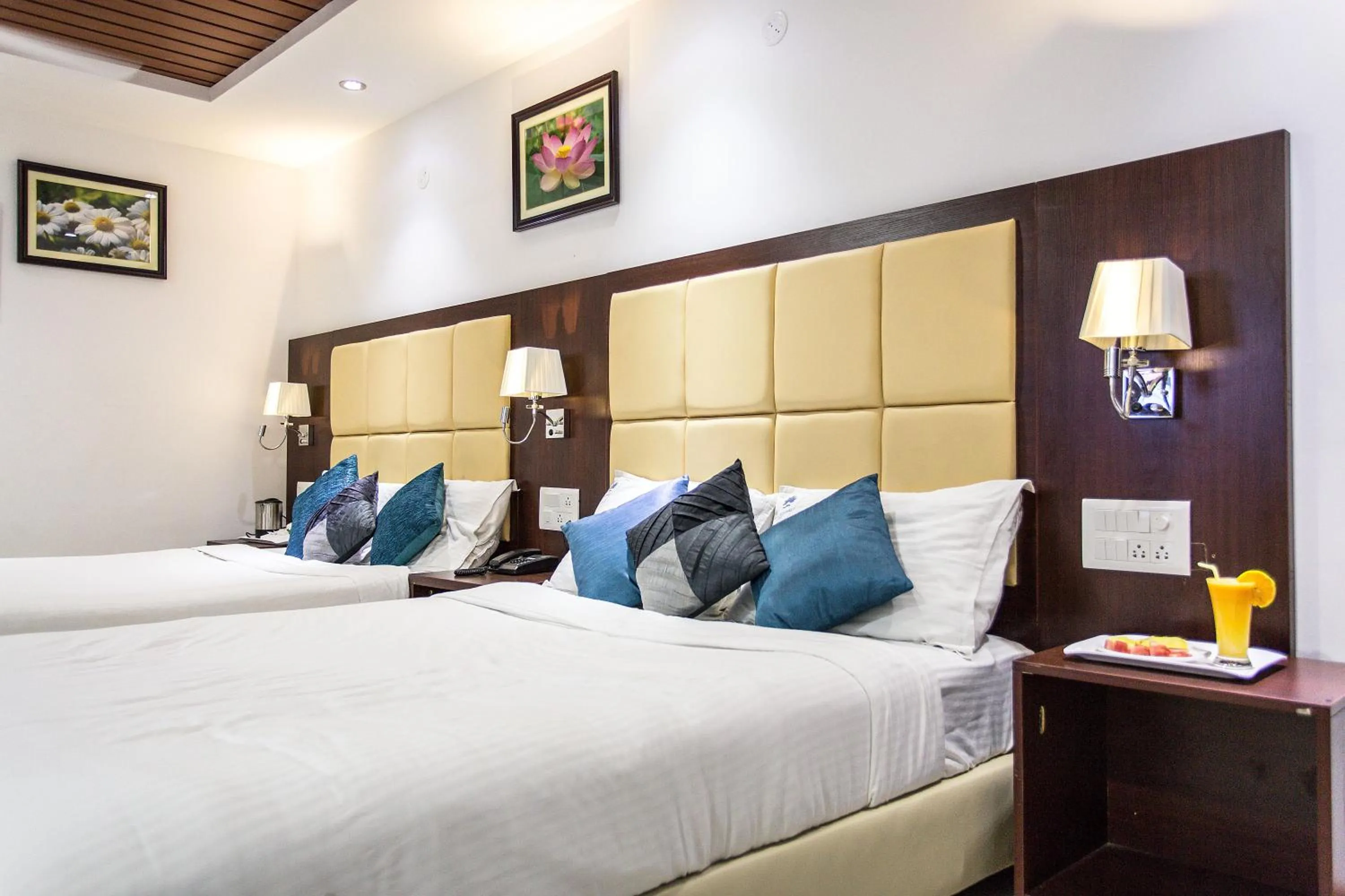 Photo of the whole room, Bed in Rajmahal Inn