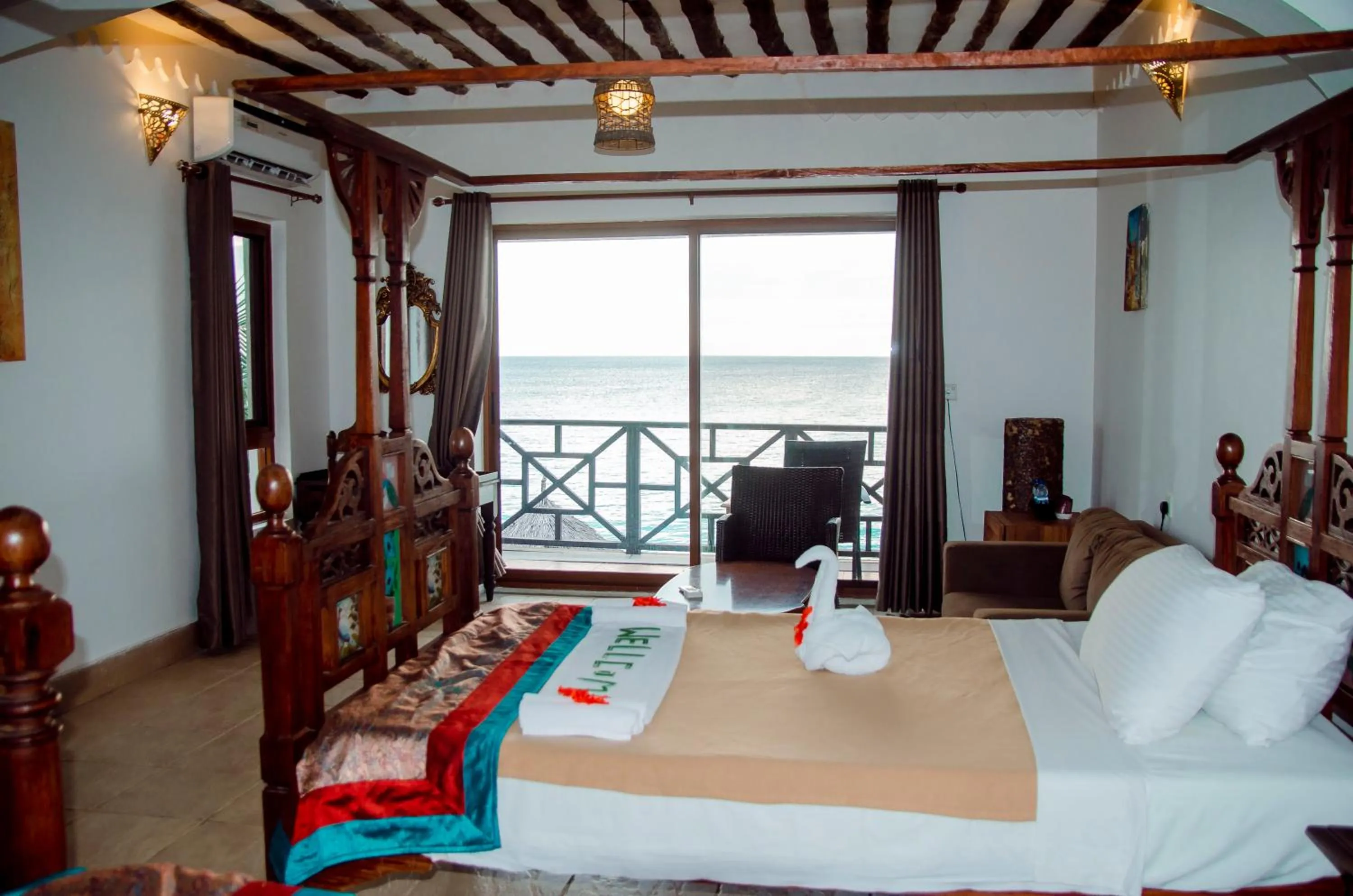 Bed in Langi Langi Beach Bungalows