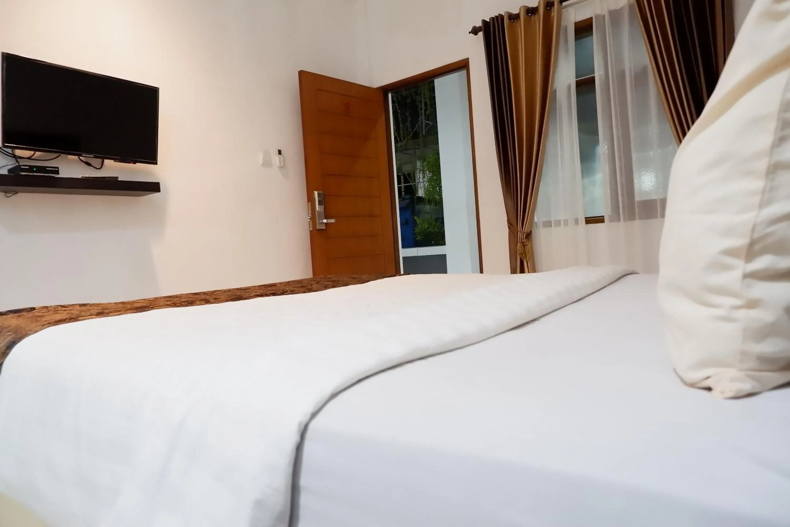 Bedroom, Bed in Hotel Netral Jombang