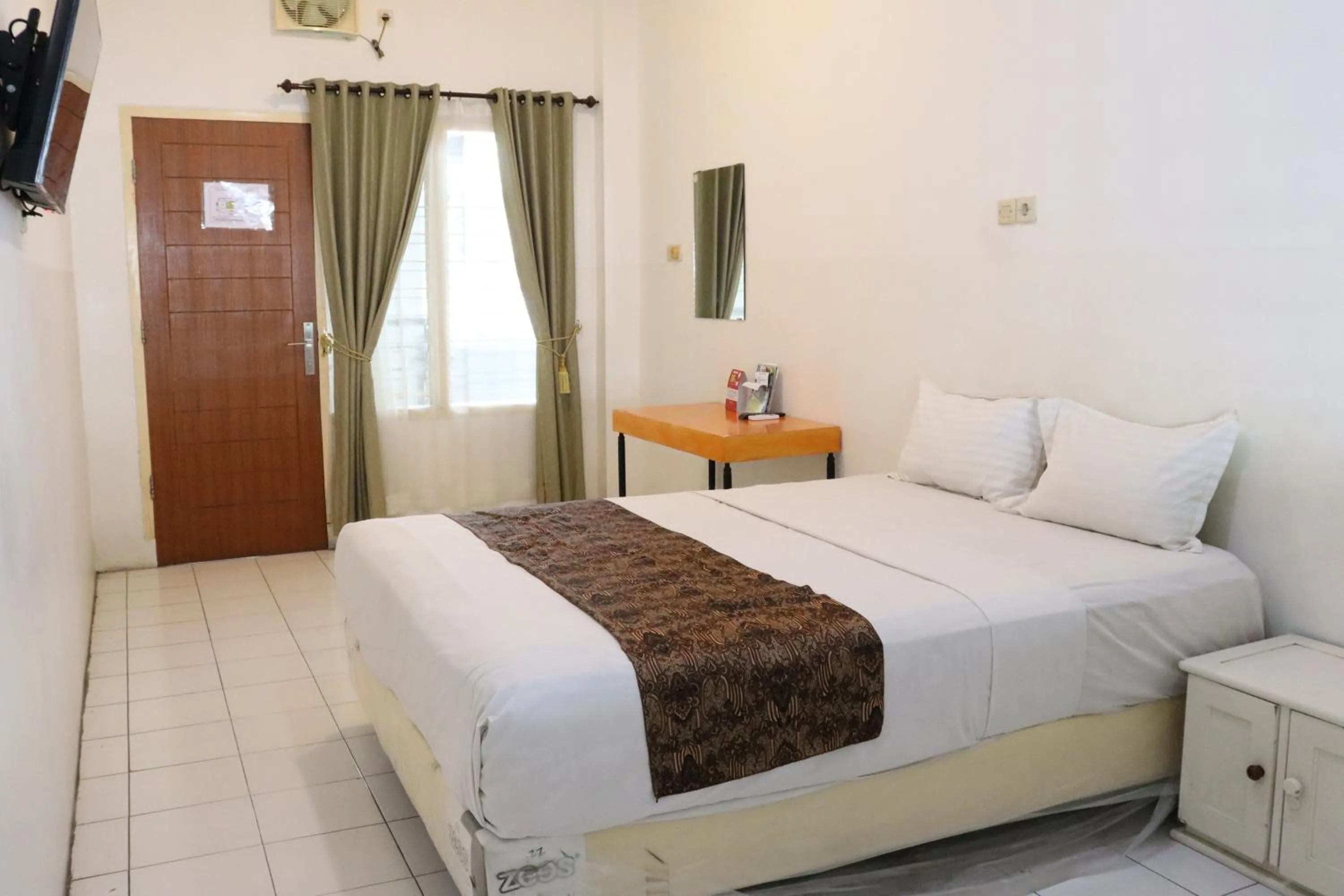 Bed in Hotel Netral Jombang