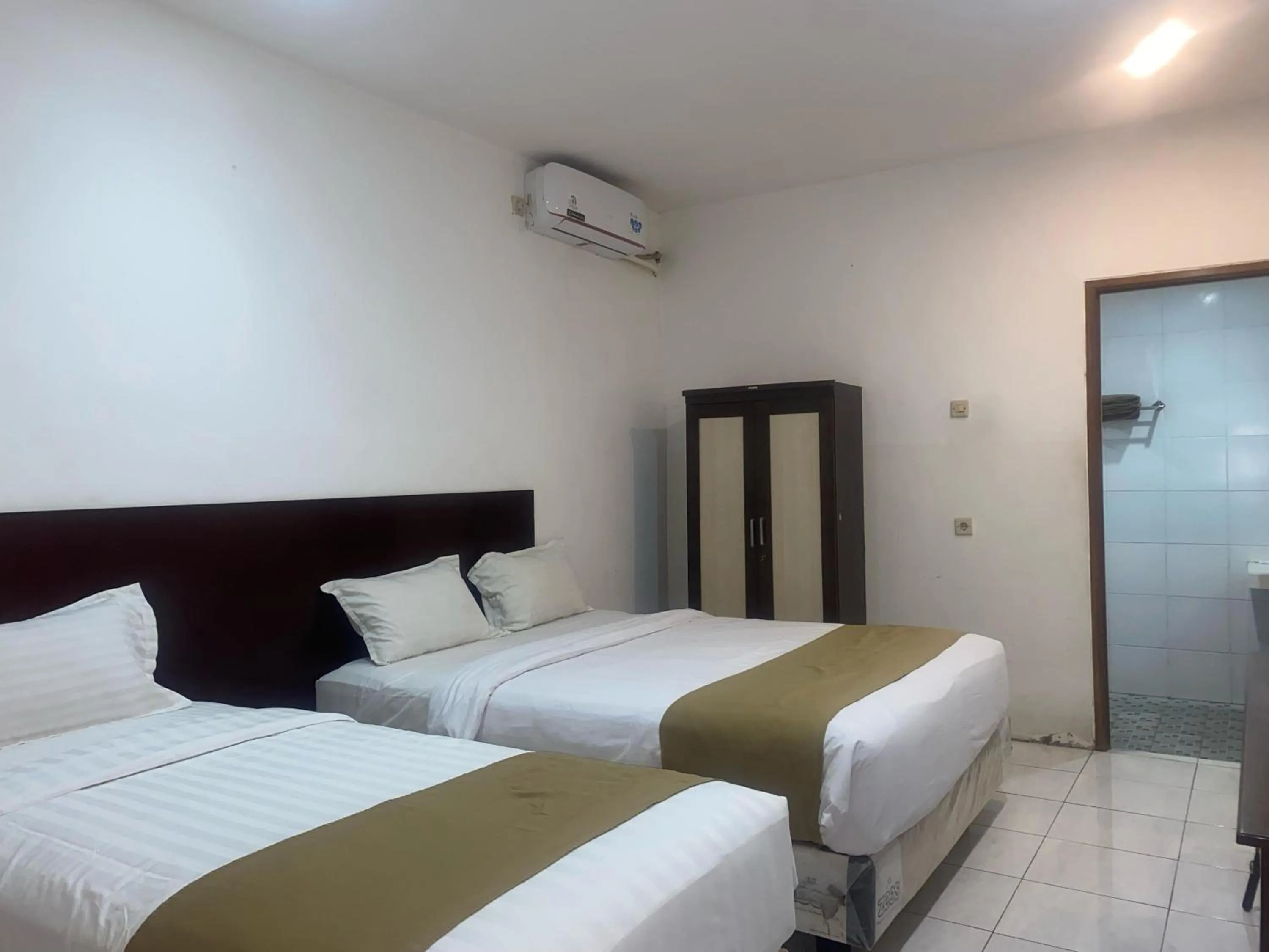 Bed in Hotel Netral Jombang