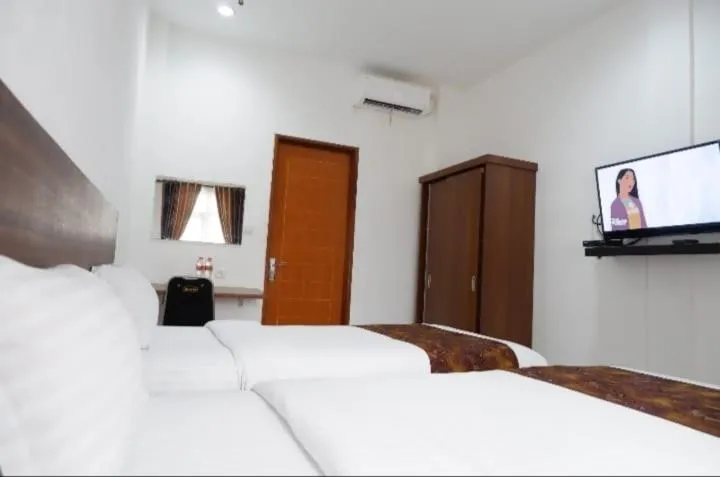 Bed in Hotel Netral Jombang