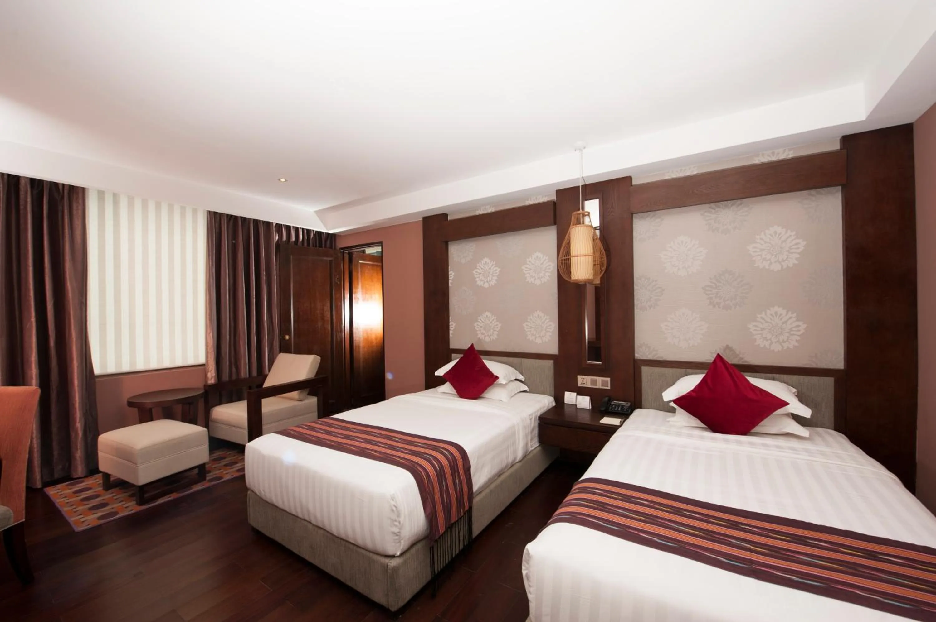 Bed in Rose Garden Hotel