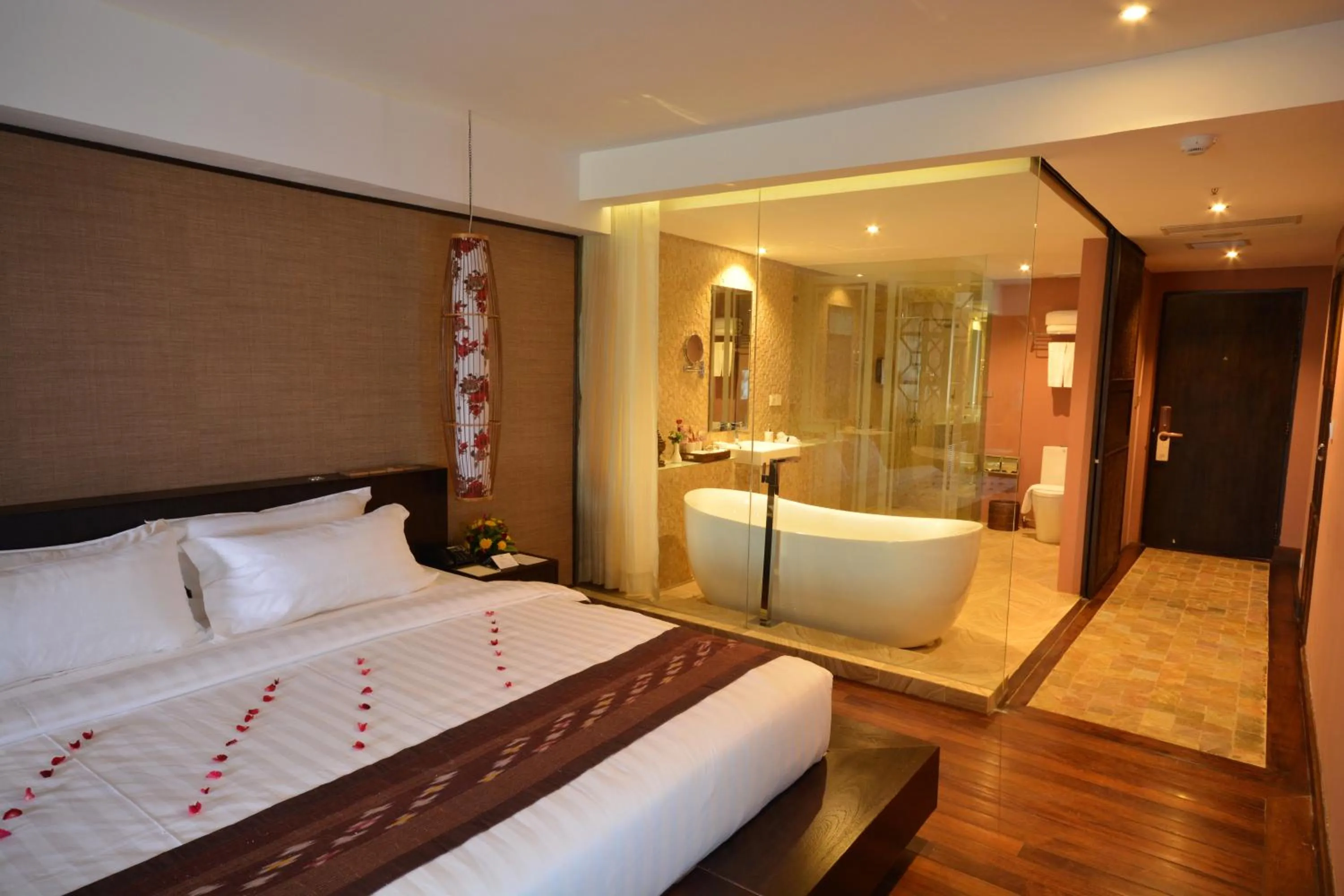 Bed in Rose Garden Hotel