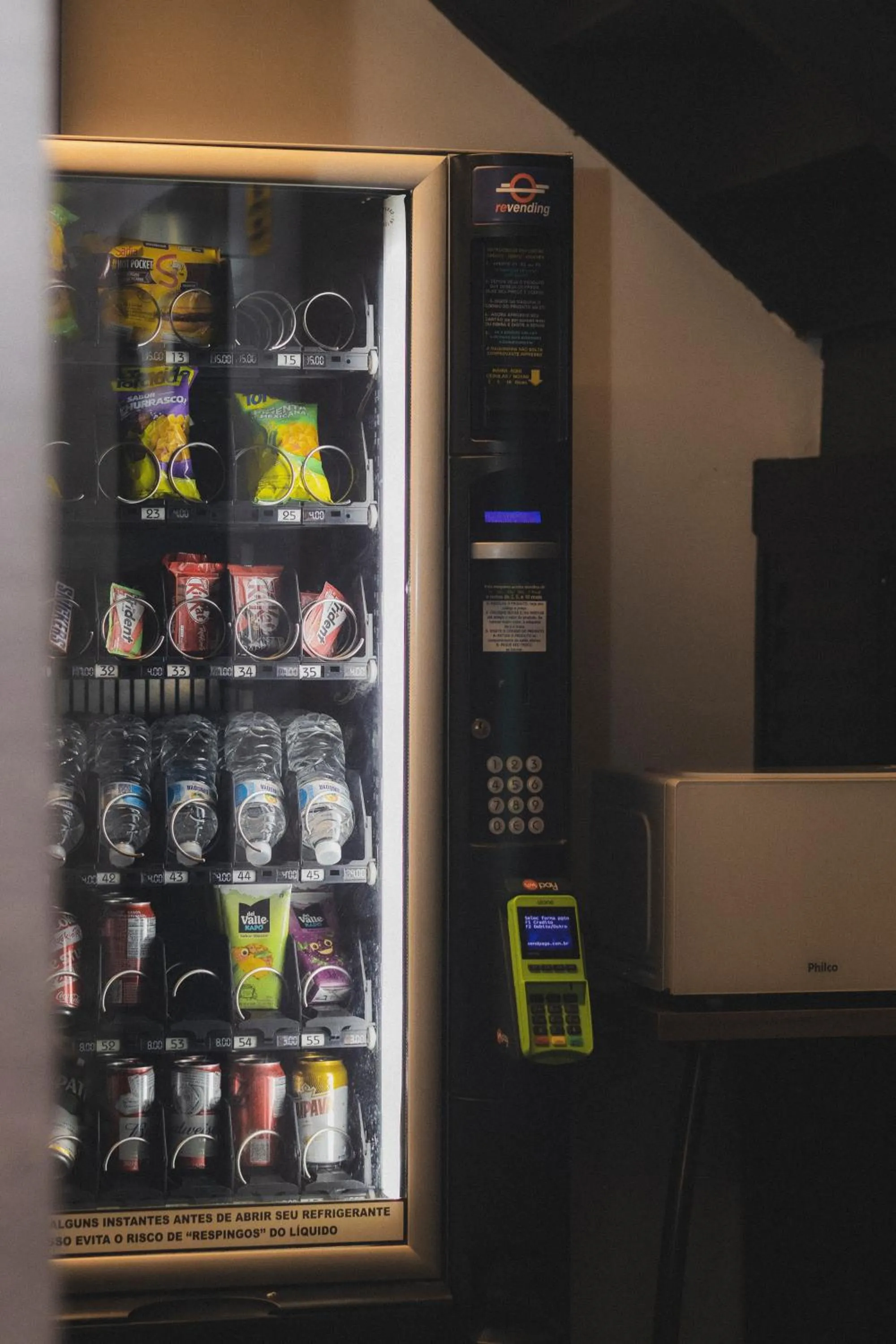 Communal lounge/ TV room in Uny Hotéis Brás