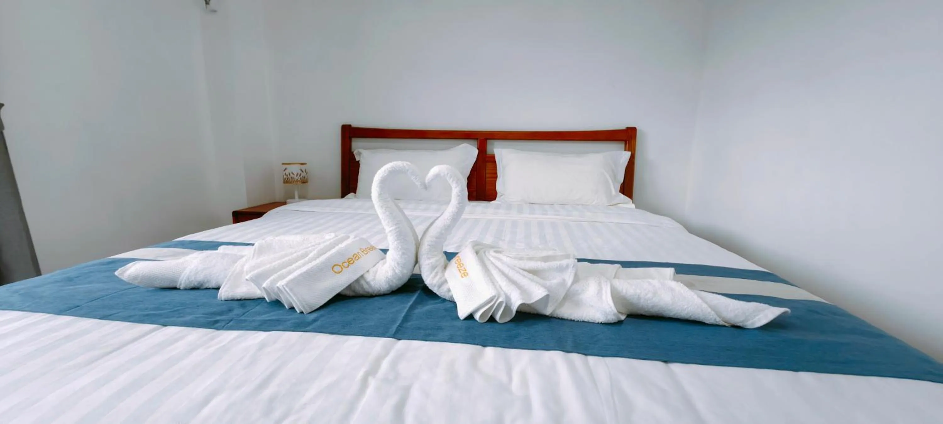 Bed in Ocean Breeze Apartment Hotel