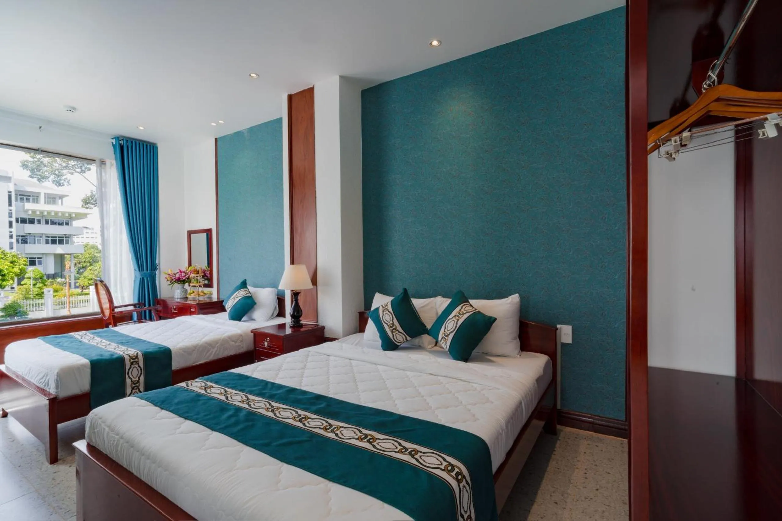 Bed in CHUONG DUONG HOTEL