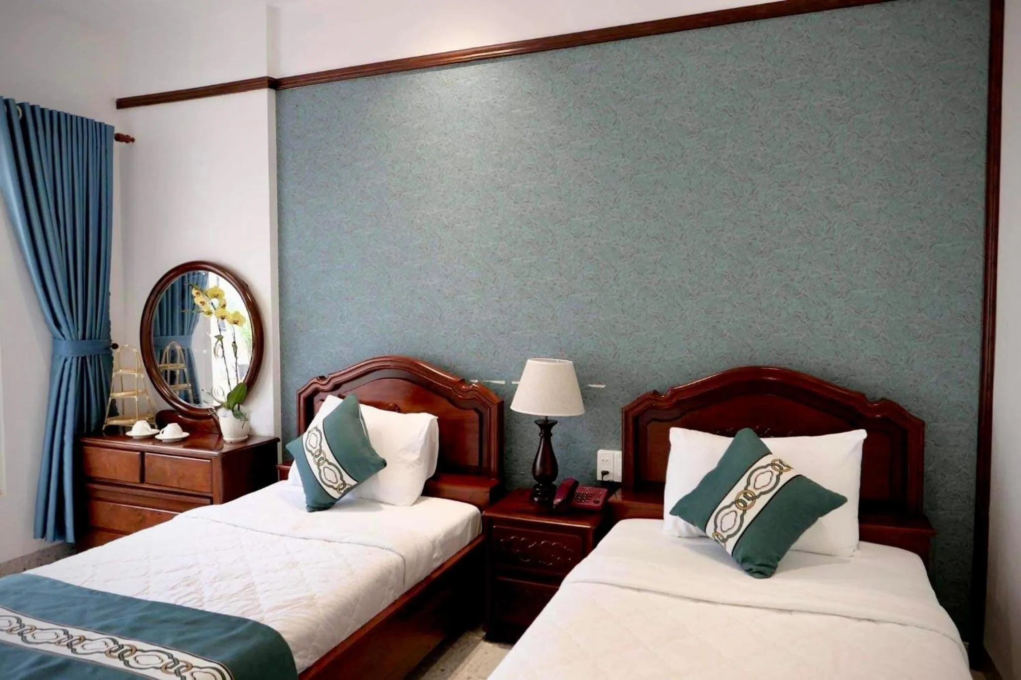 Bed in CHUONG DUONG HOTEL