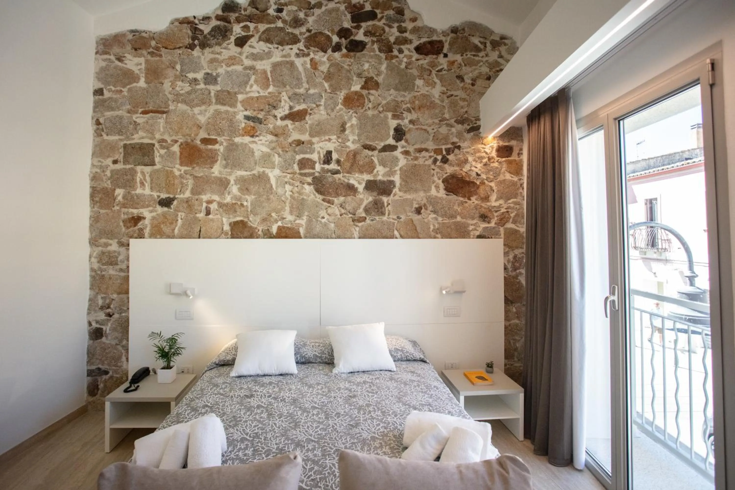 Bed in Domu Noa Hotel