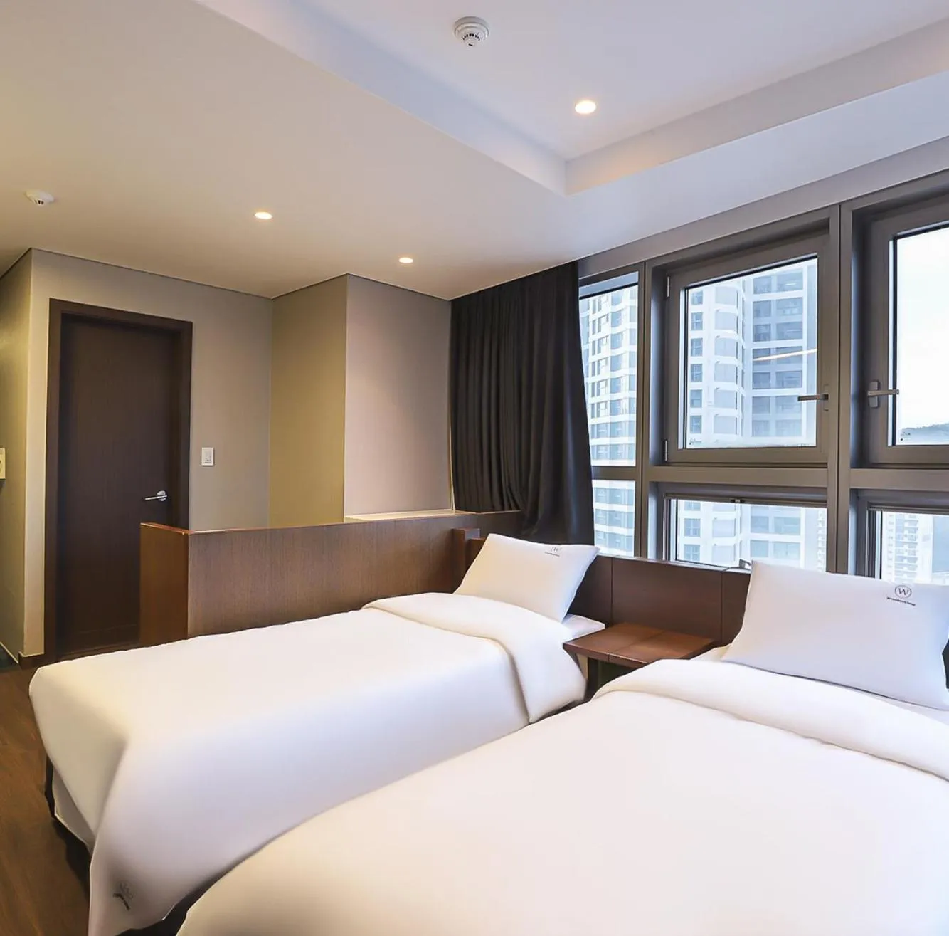 Bed in W Residence Hotel