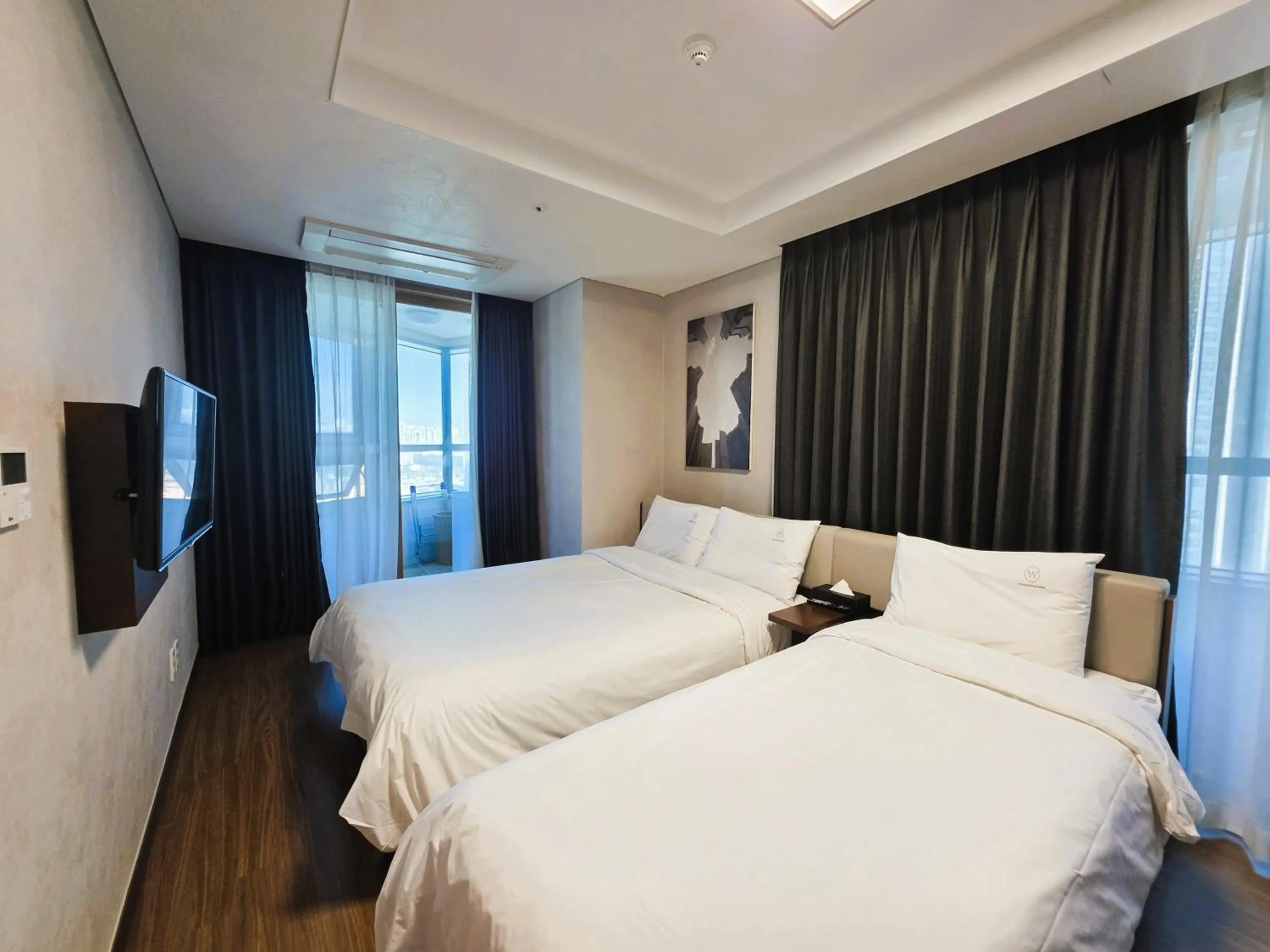 Bed in W Residence Hotel