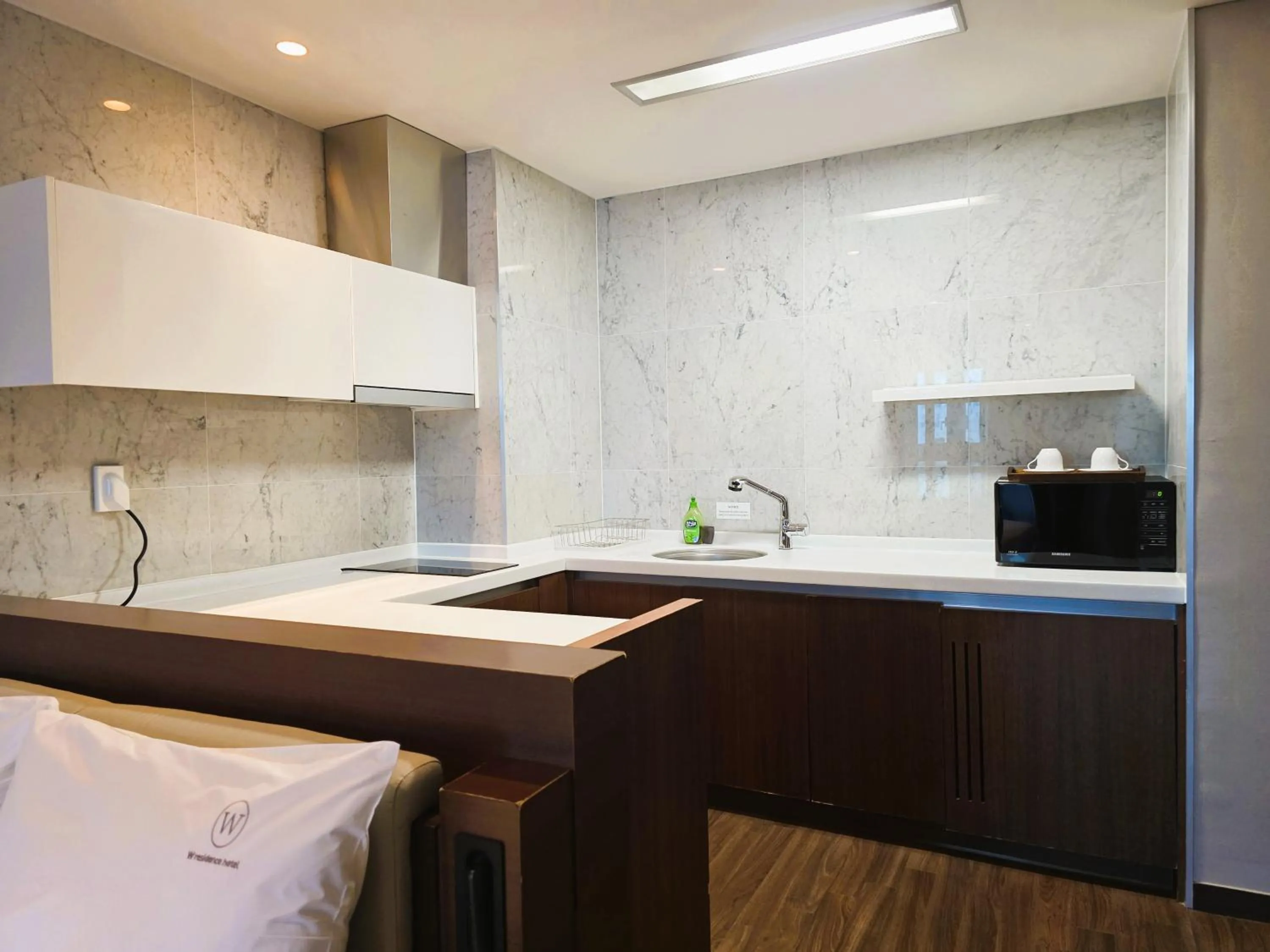 Bed in W Residence Hotel