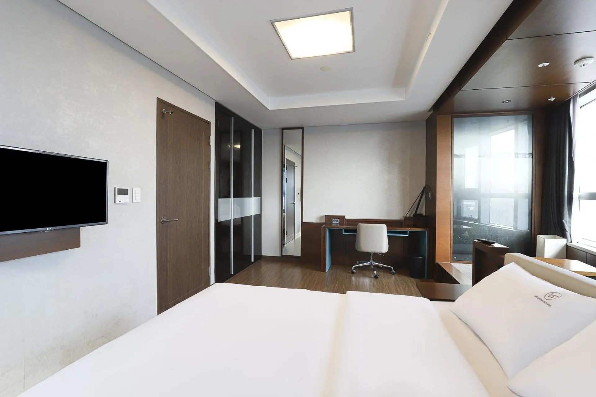 Bed in W Residence Hotel