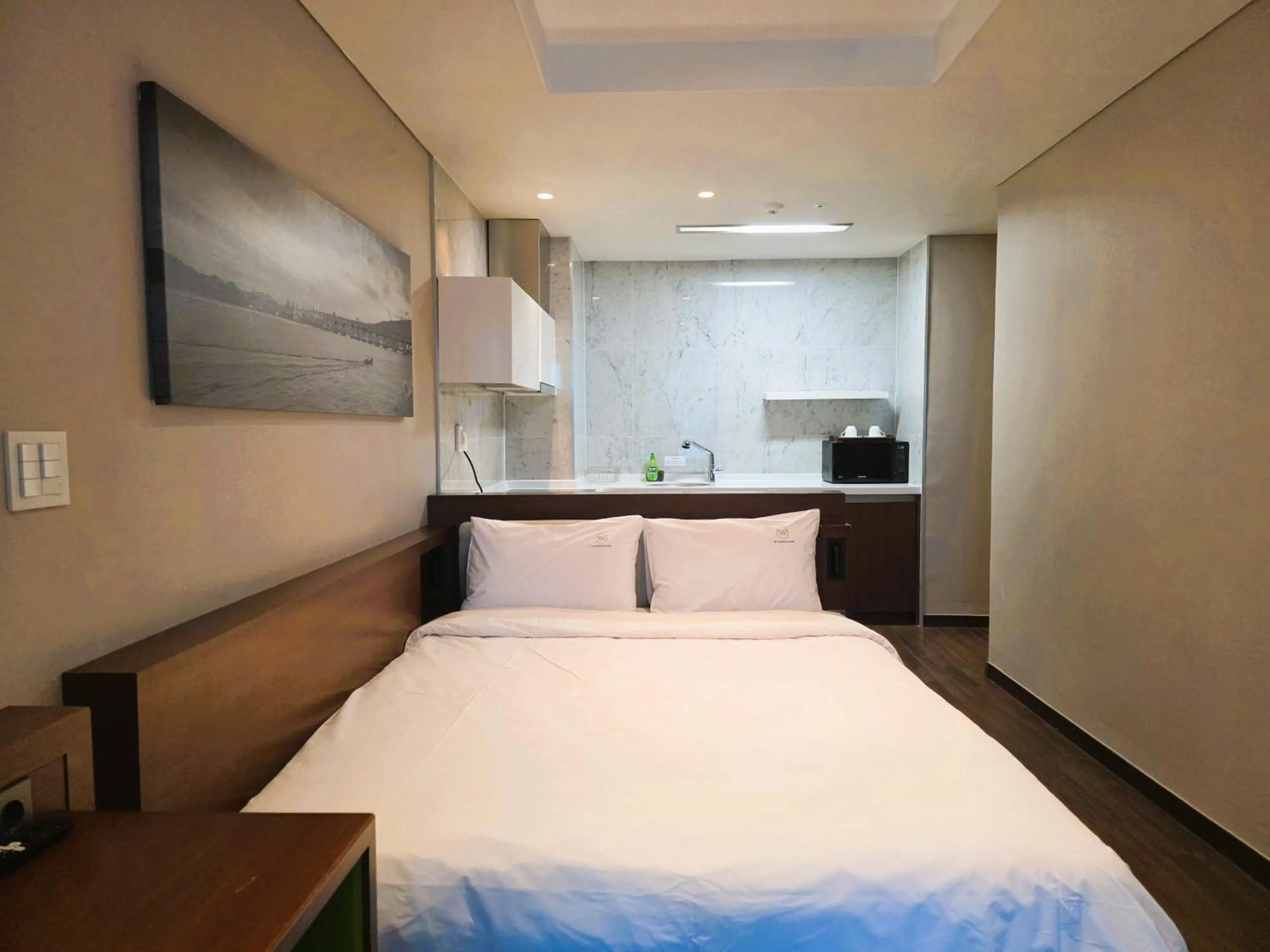Bed in W Residence Hotel