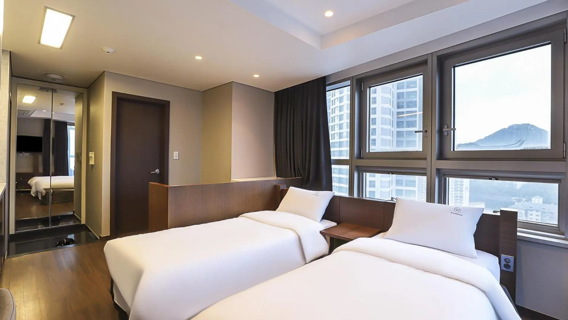 Bed in W Residence Hotel