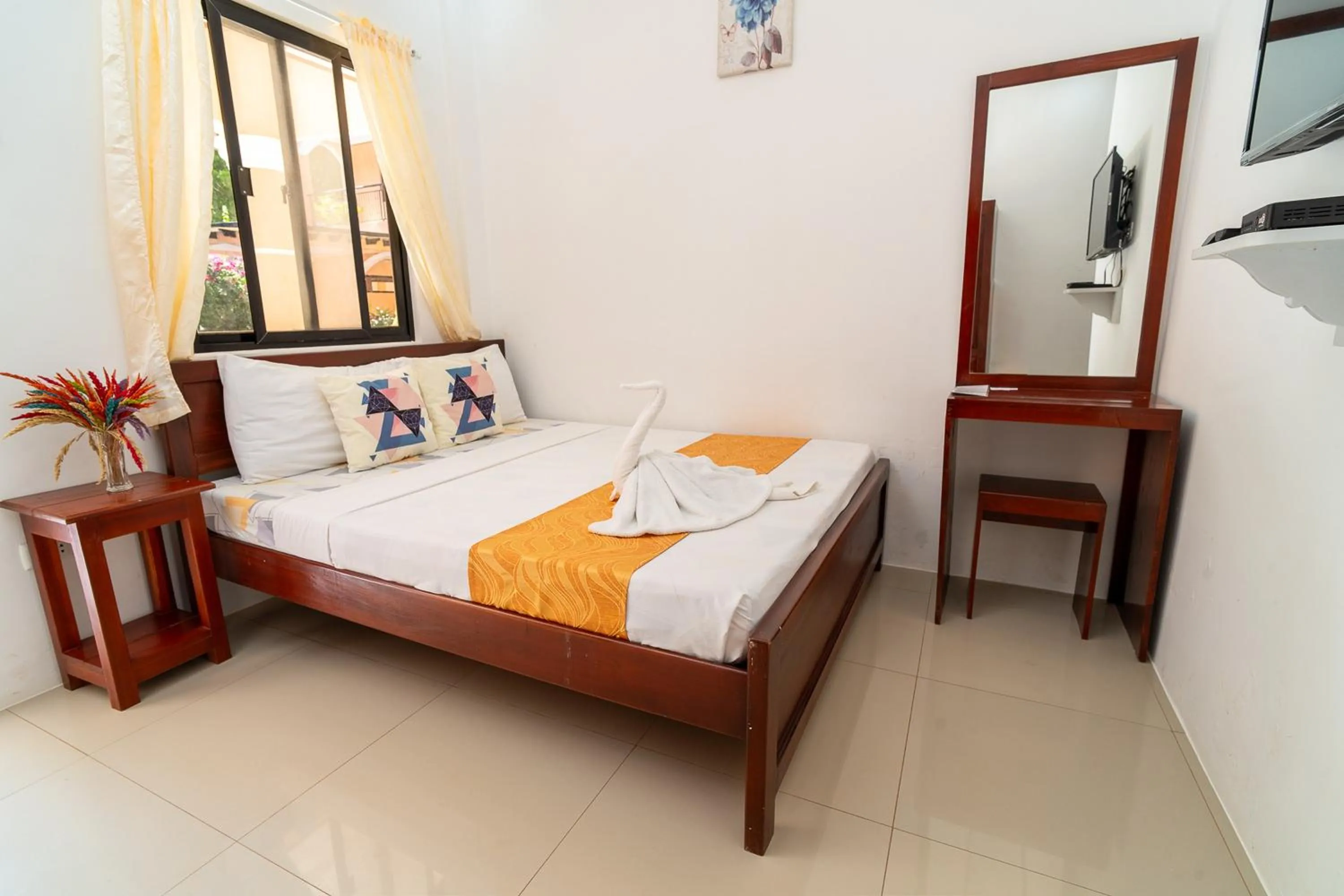 Bed in Dinah's Tourist Inn Puerto Princesa