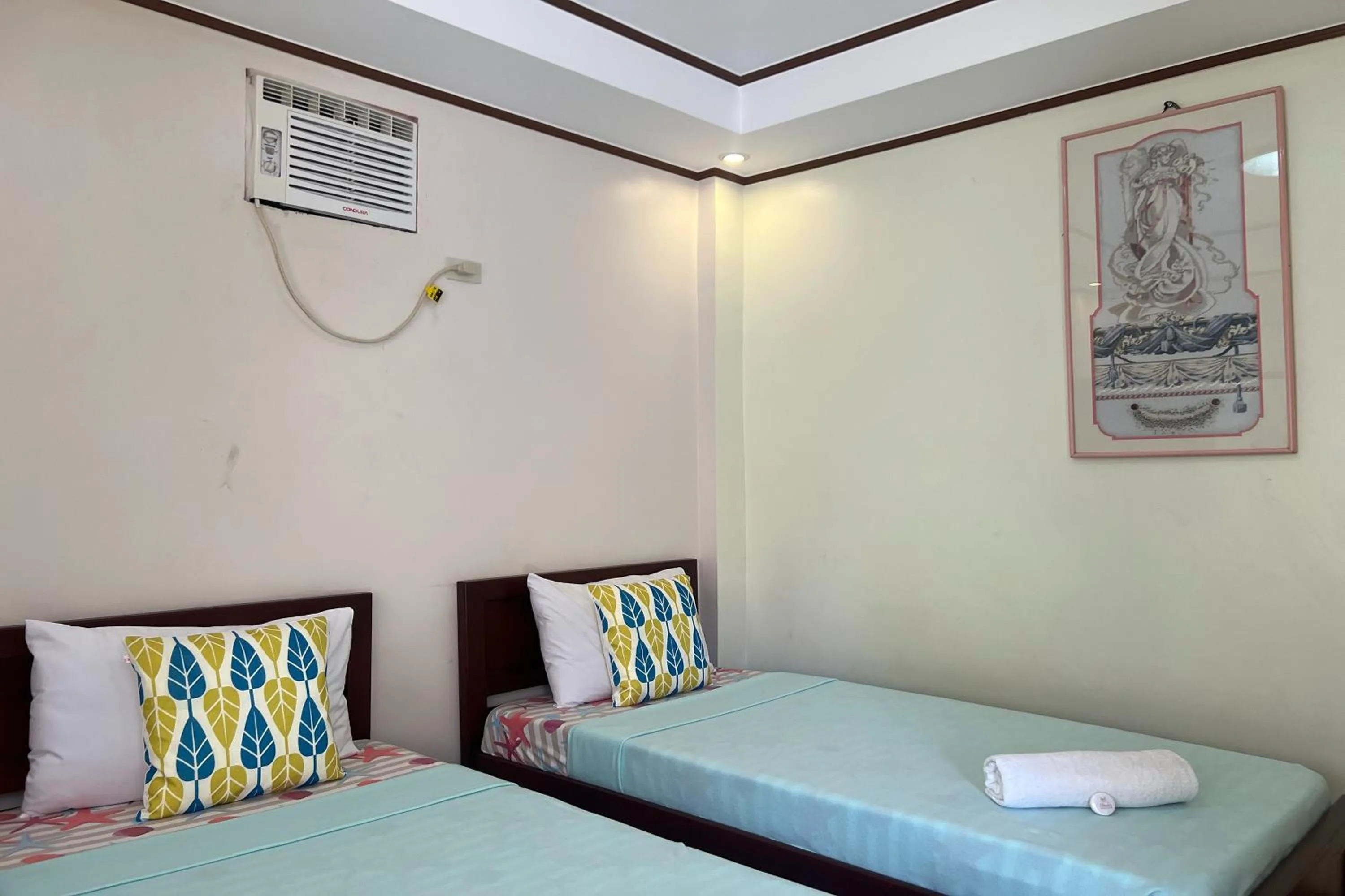 Bedroom, Bed in Dinah's Tourist Inn Puerto Princesa