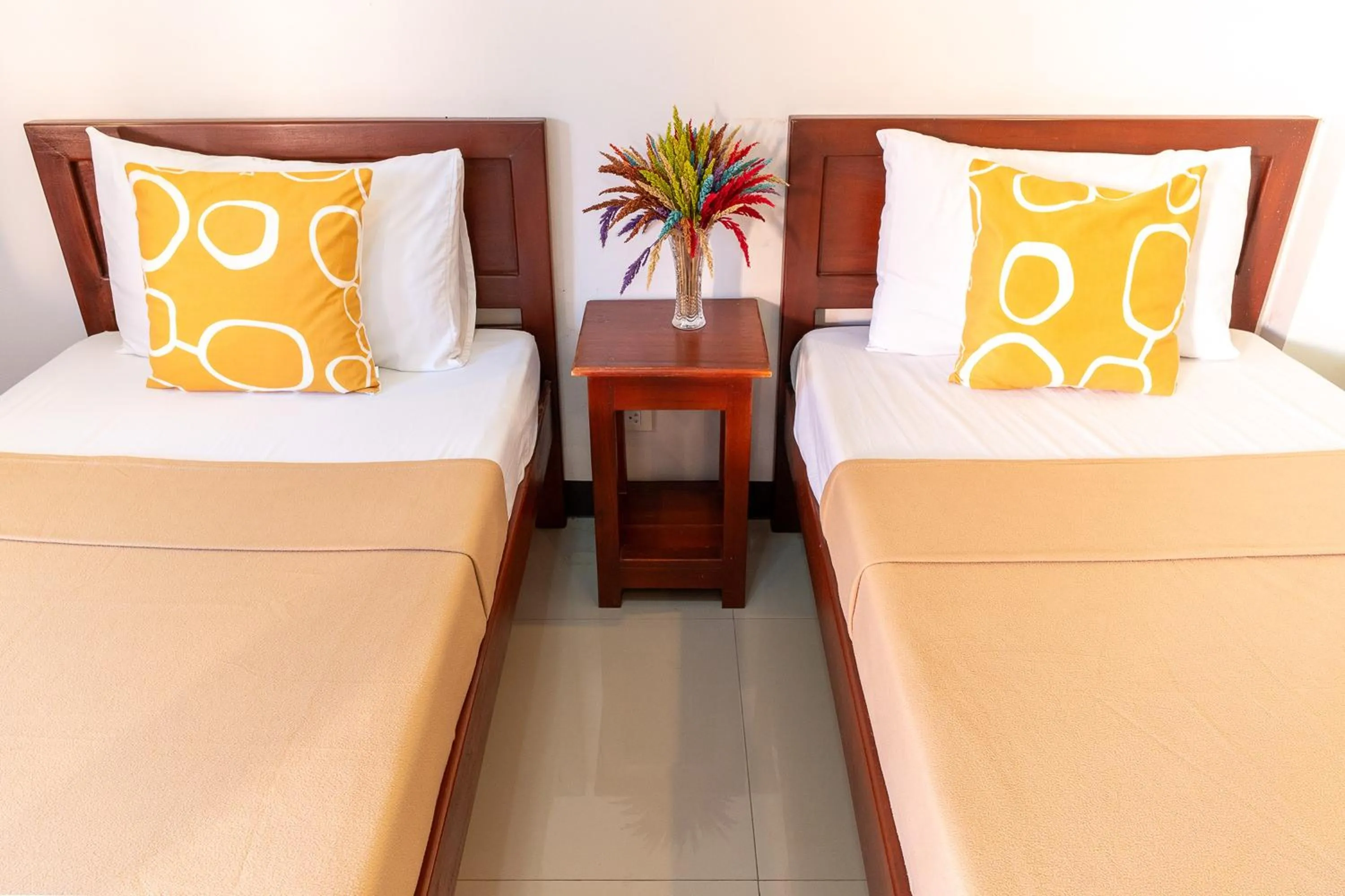 Bedroom, Bed in Dinah's Tourist Inn Puerto Princesa