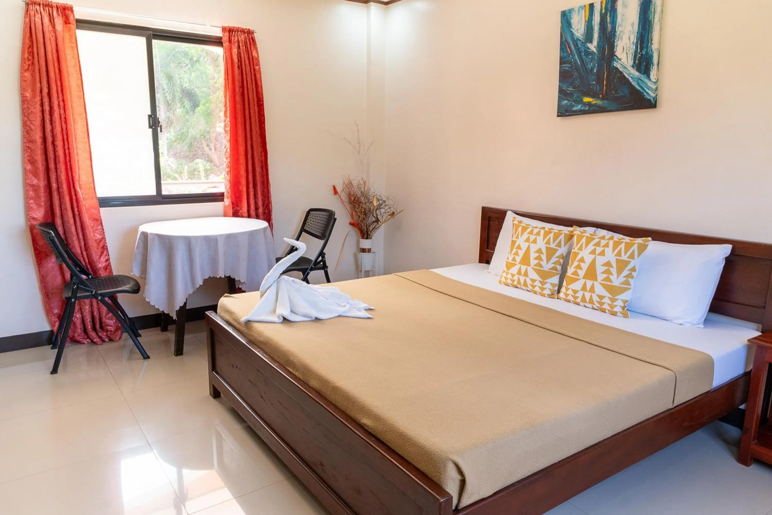 Bedroom, Bed in Dinah's Tourist Inn Puerto Princesa