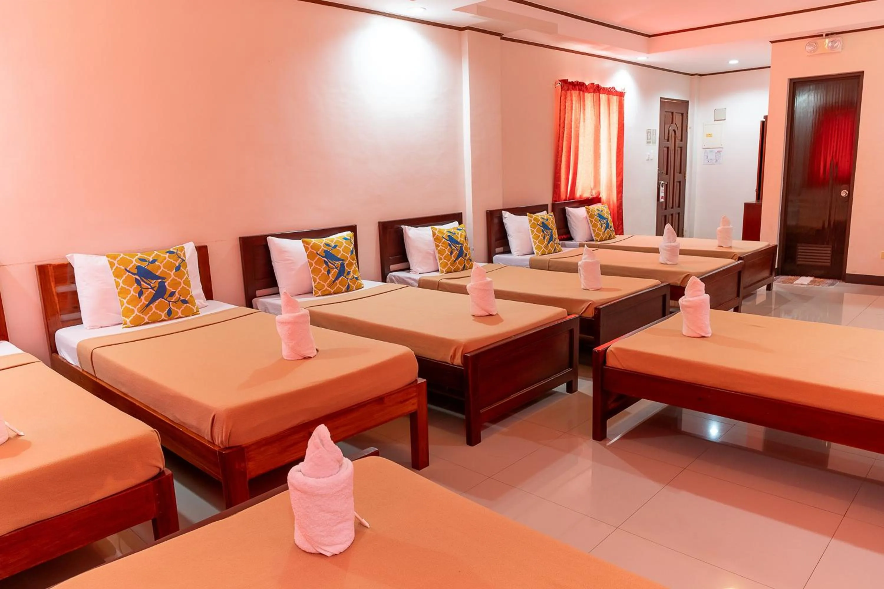 Bedroom, Bed in Dinah's Tourist Inn Puerto Princesa