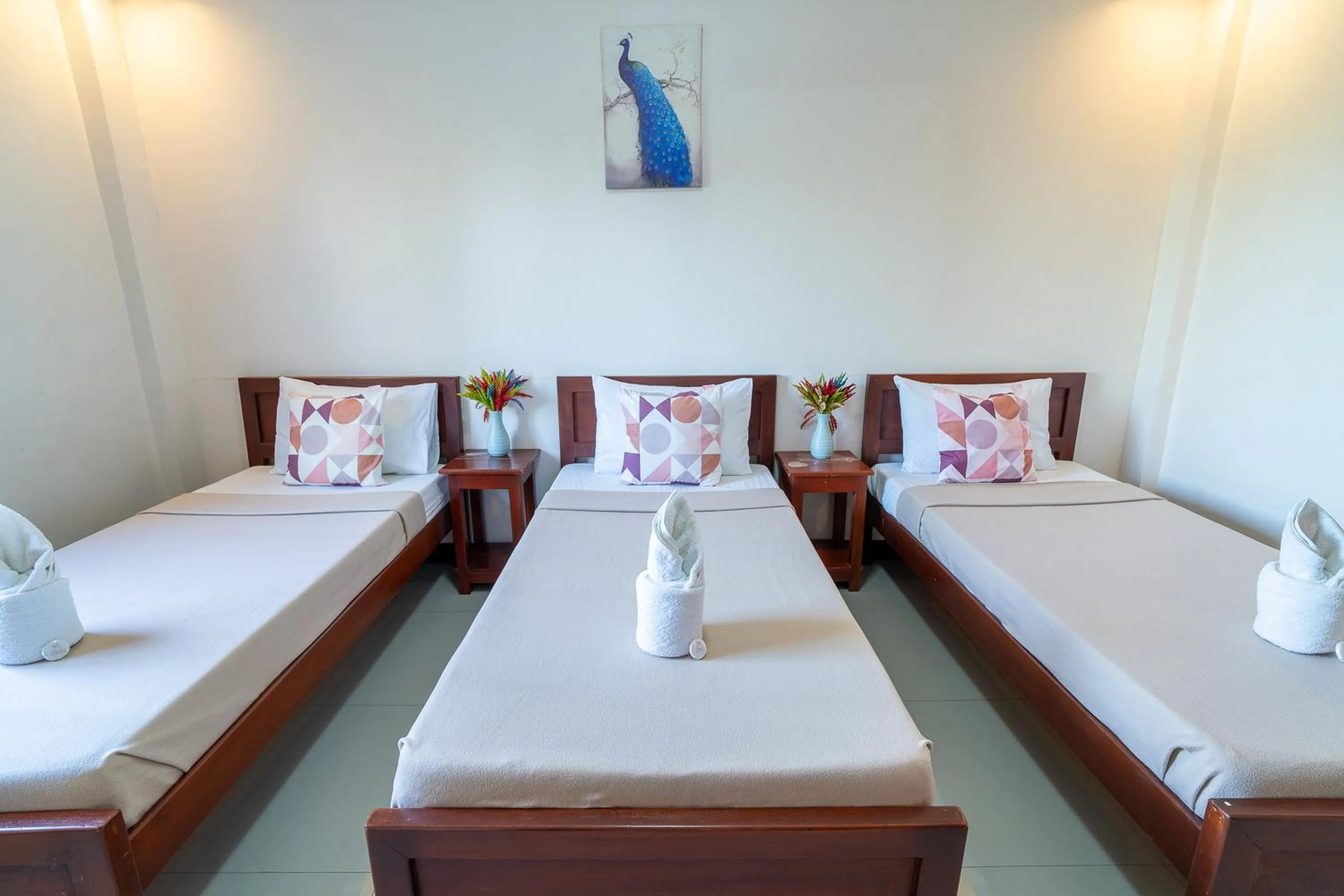 Bed in Dinah's Tourist Inn Puerto Princesa