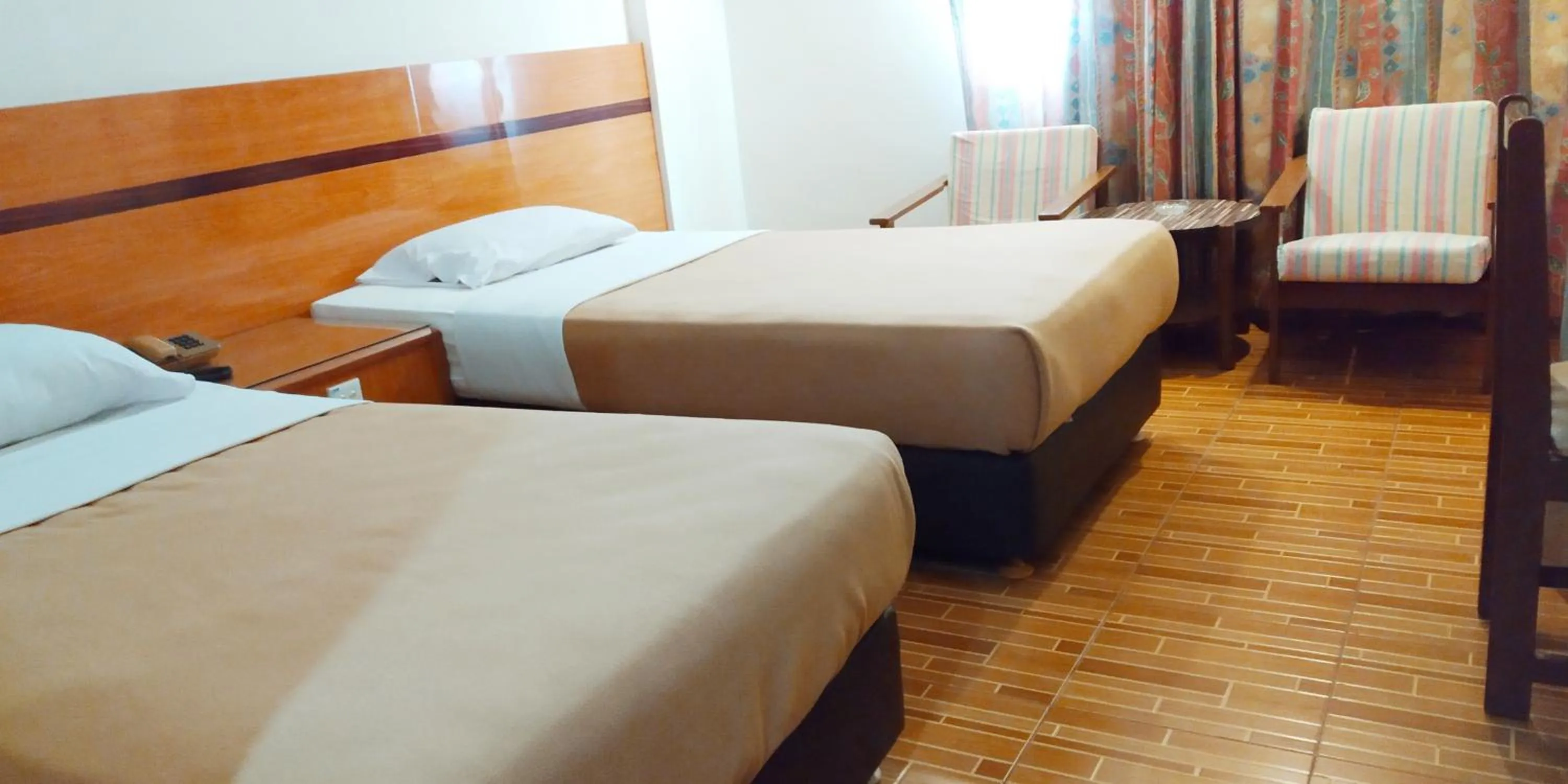 Bed in Paradise Hotel