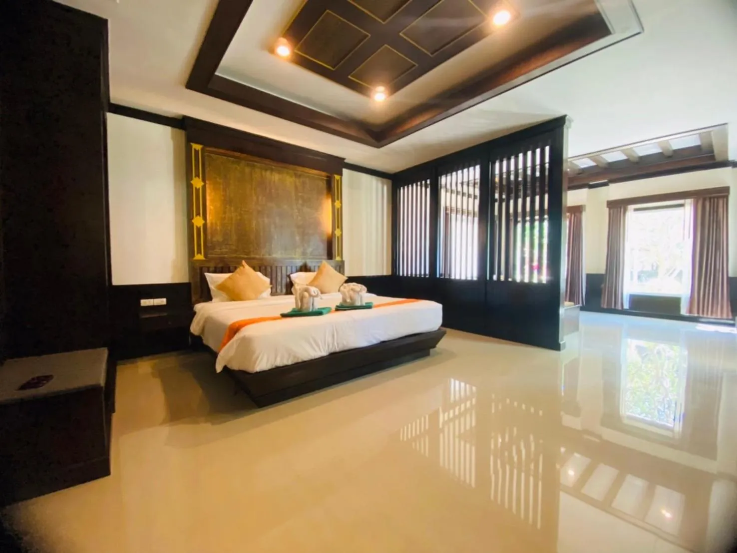 Bedroom, Bed in Hotel and Beach Bungalow at Lanta Resort