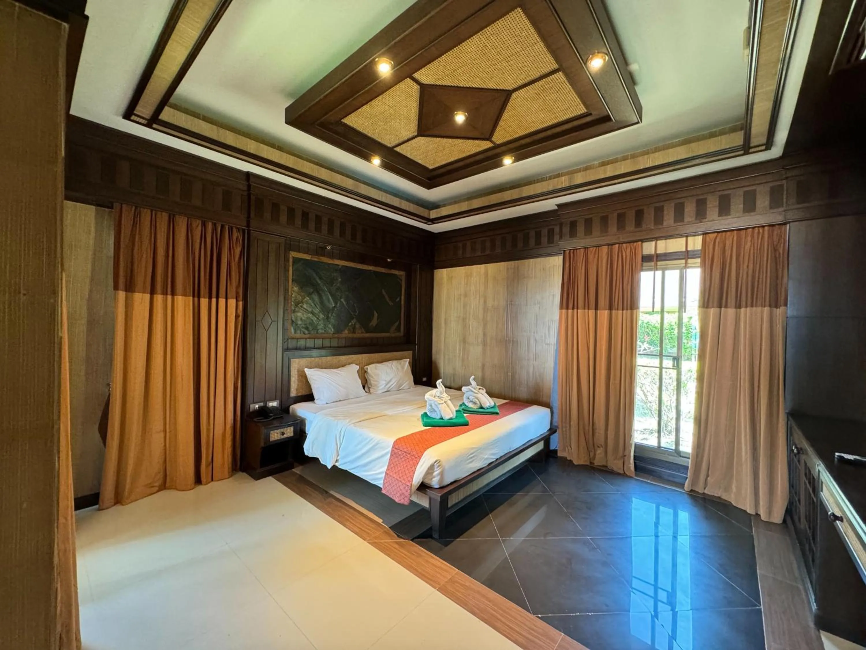 Bed in Hotel and Beach Bungalow at Lanta Resort