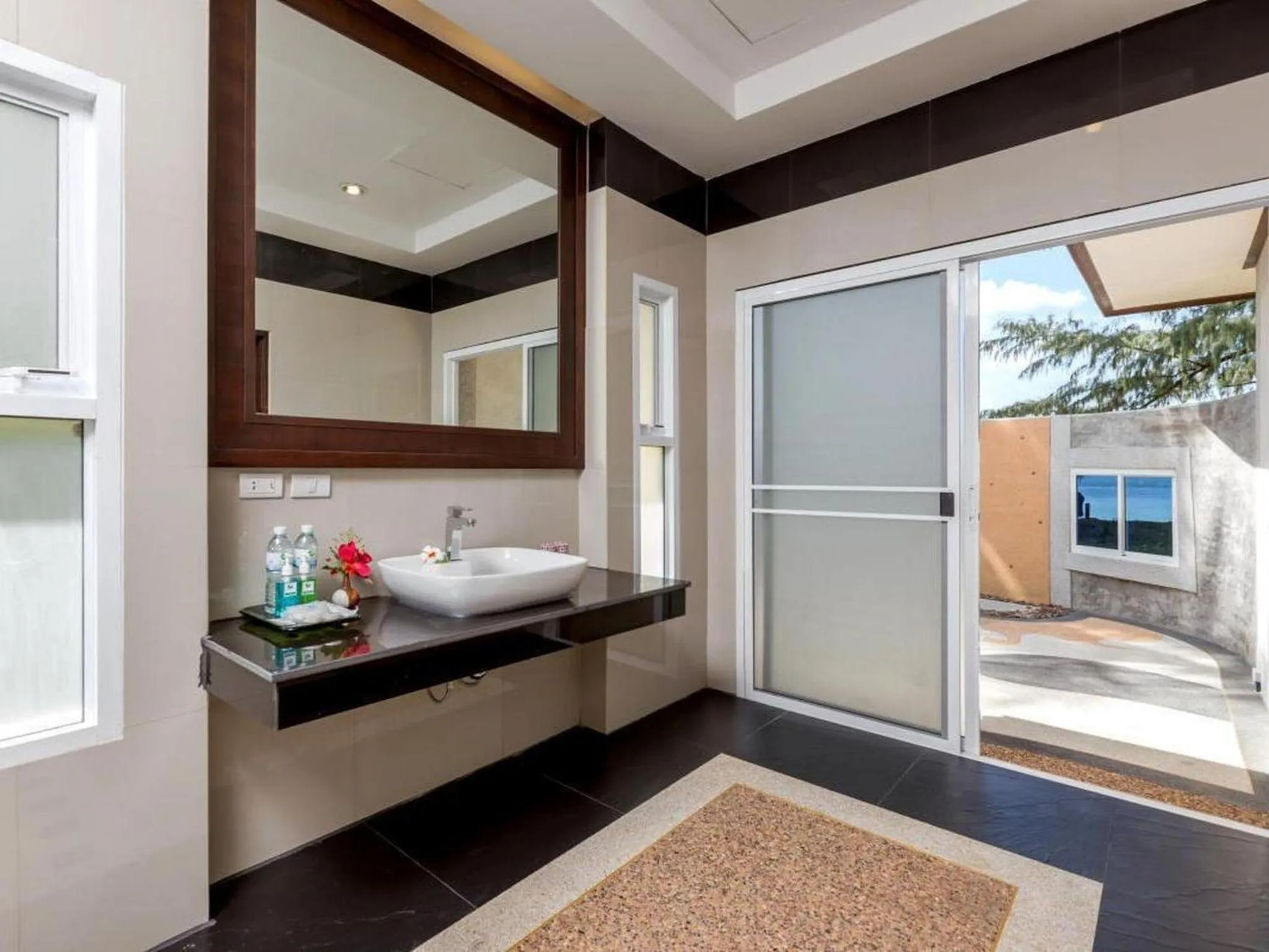 Bathroom, Bed in Hotel and Beach Bungalow at Lanta Resort