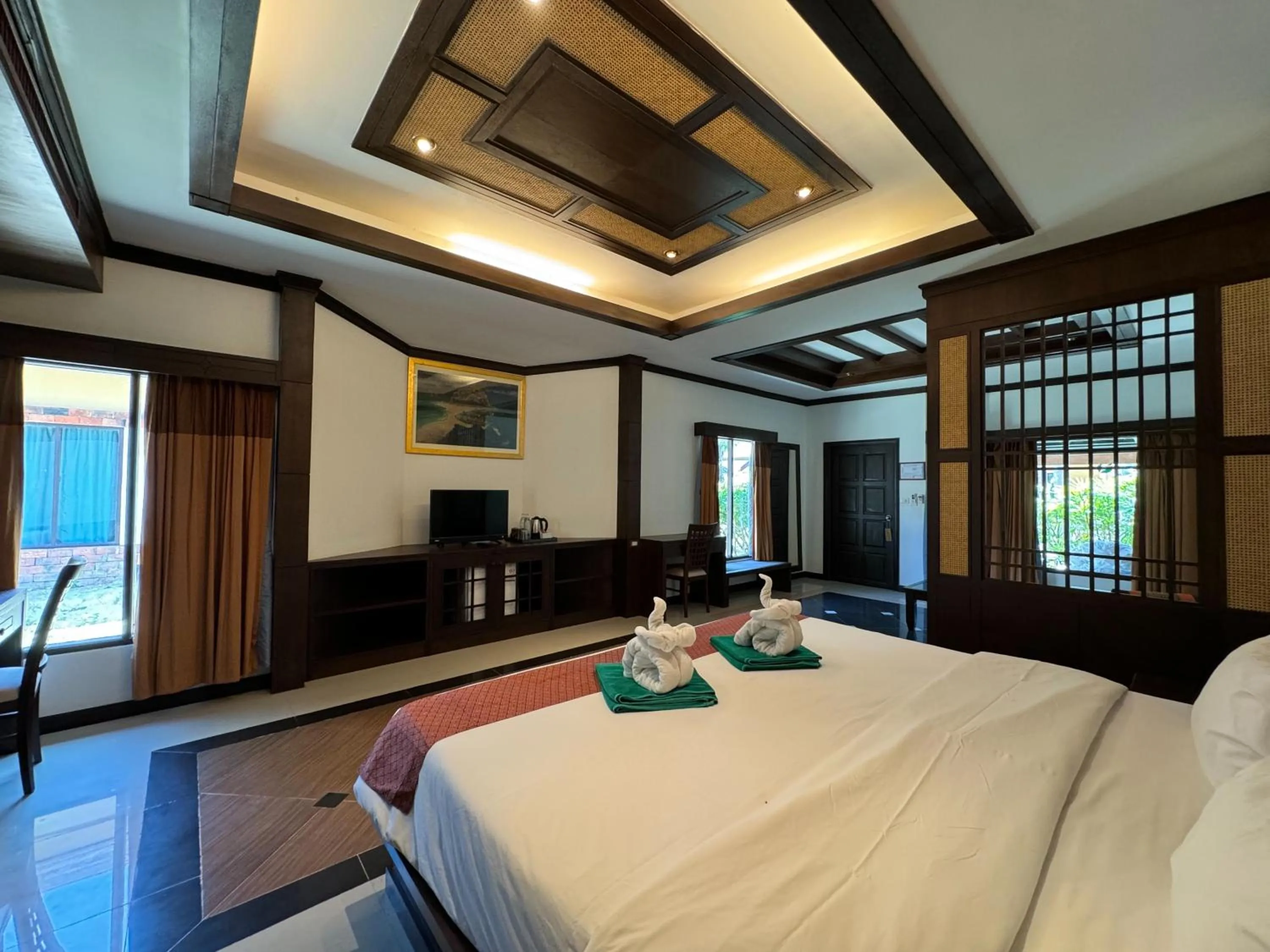 Bedroom, Bed in Hotel and Beach Bungalow at Lanta Resort