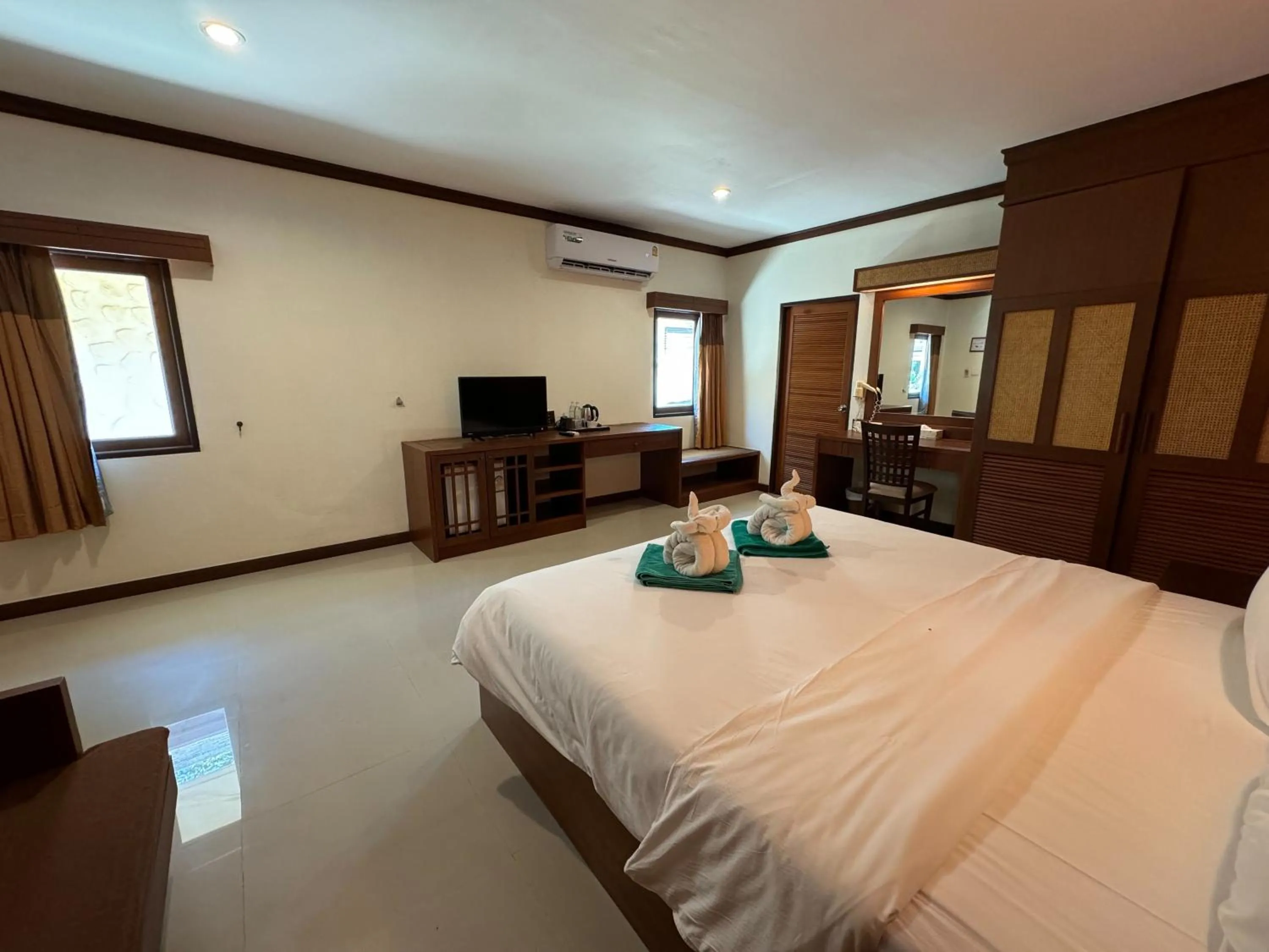 Bedroom, Bed in Hotel and Beach Bungalow at Lanta Resort