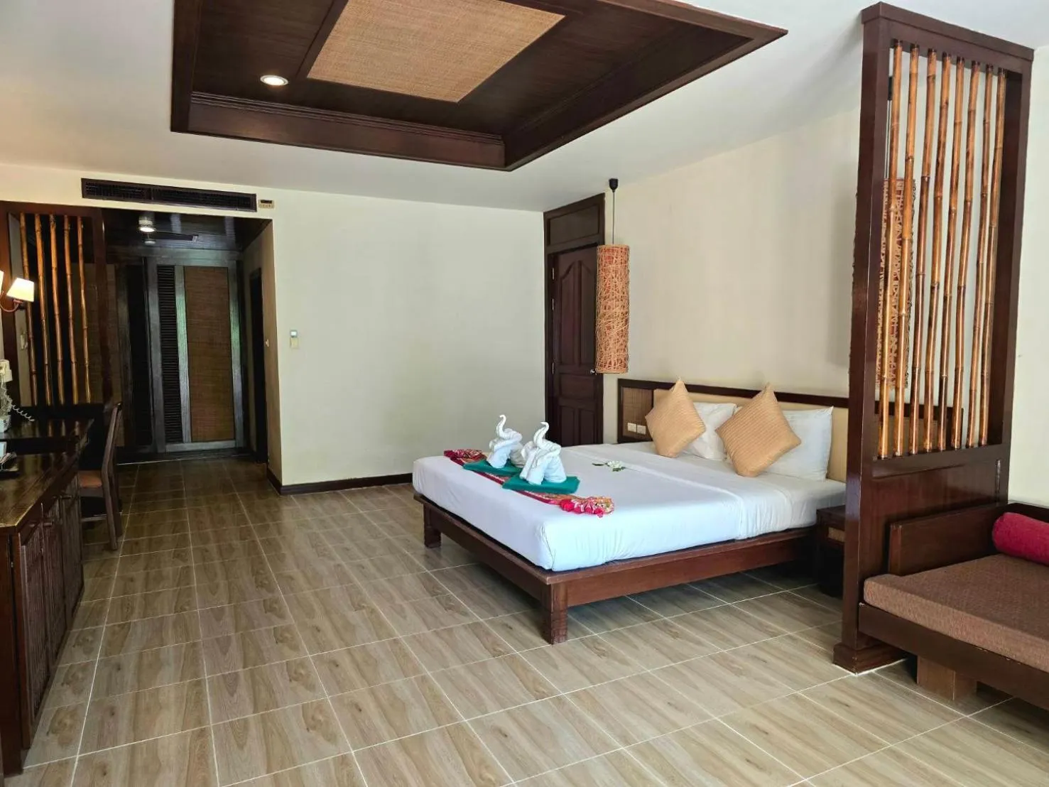 Bed in Hotel and Beach Bungalow at Lanta Resort
