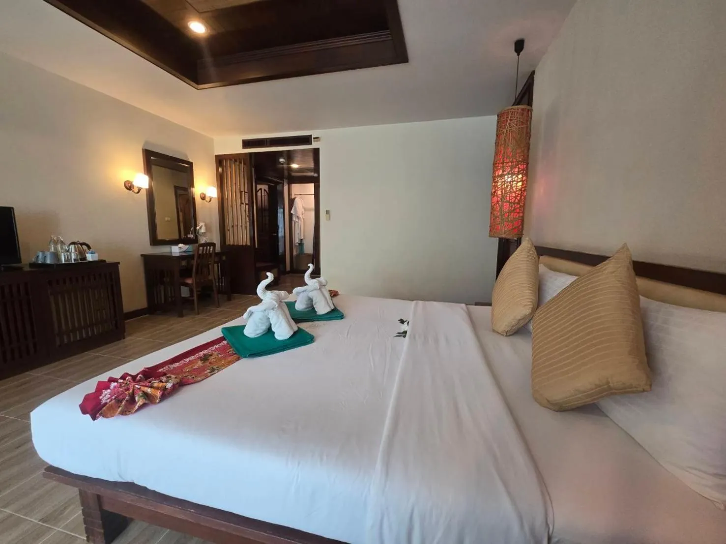 Bed in Hotel and Beach Bungalow at Lanta Resort