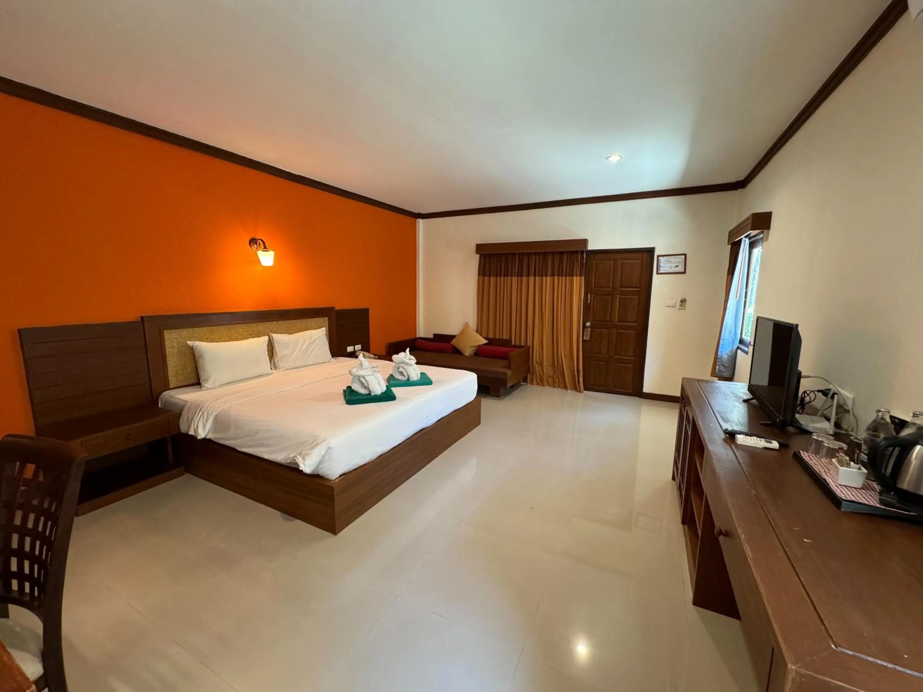 Bed in Hotel and Beach Bungalow at Lanta Resort