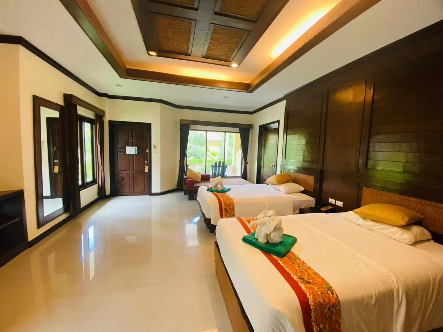 Bed in Hotel and Beach Bungalow at Lanta Resort
