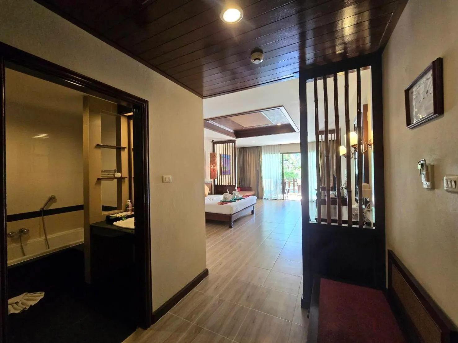 Bathroom, Bed in Hotel and Beach Bungalow at Lanta Resort