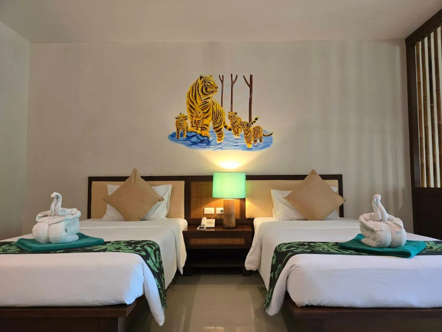 Bed in Hotel and Beach Bungalow at Lanta Resort