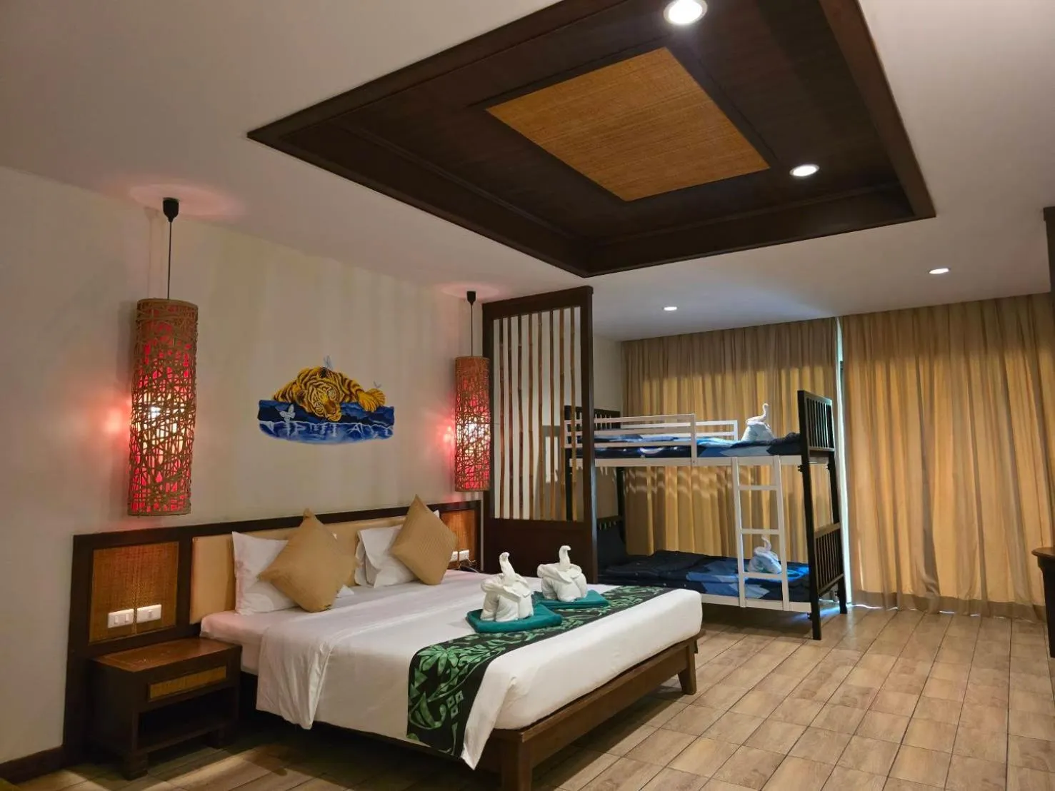 Bed in Hotel and Beach Bungalow at Lanta Resort