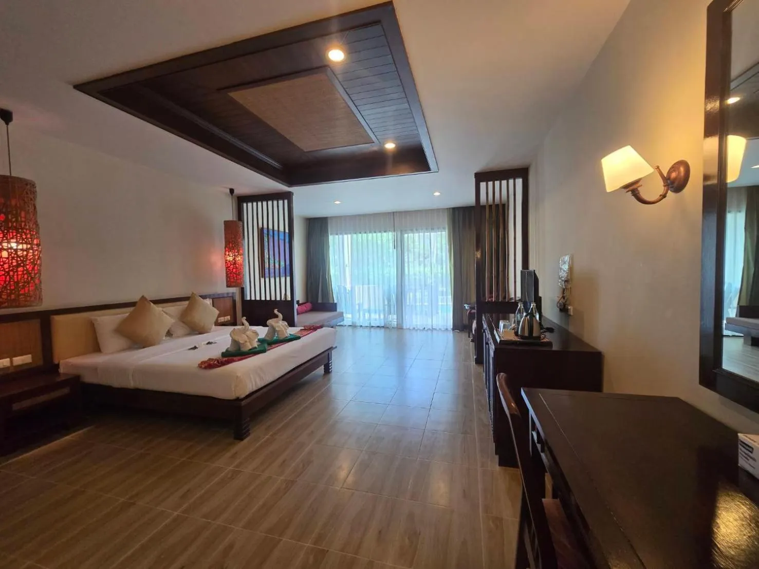 Bed in Hotel and Beach Bungalow at Lanta Resort